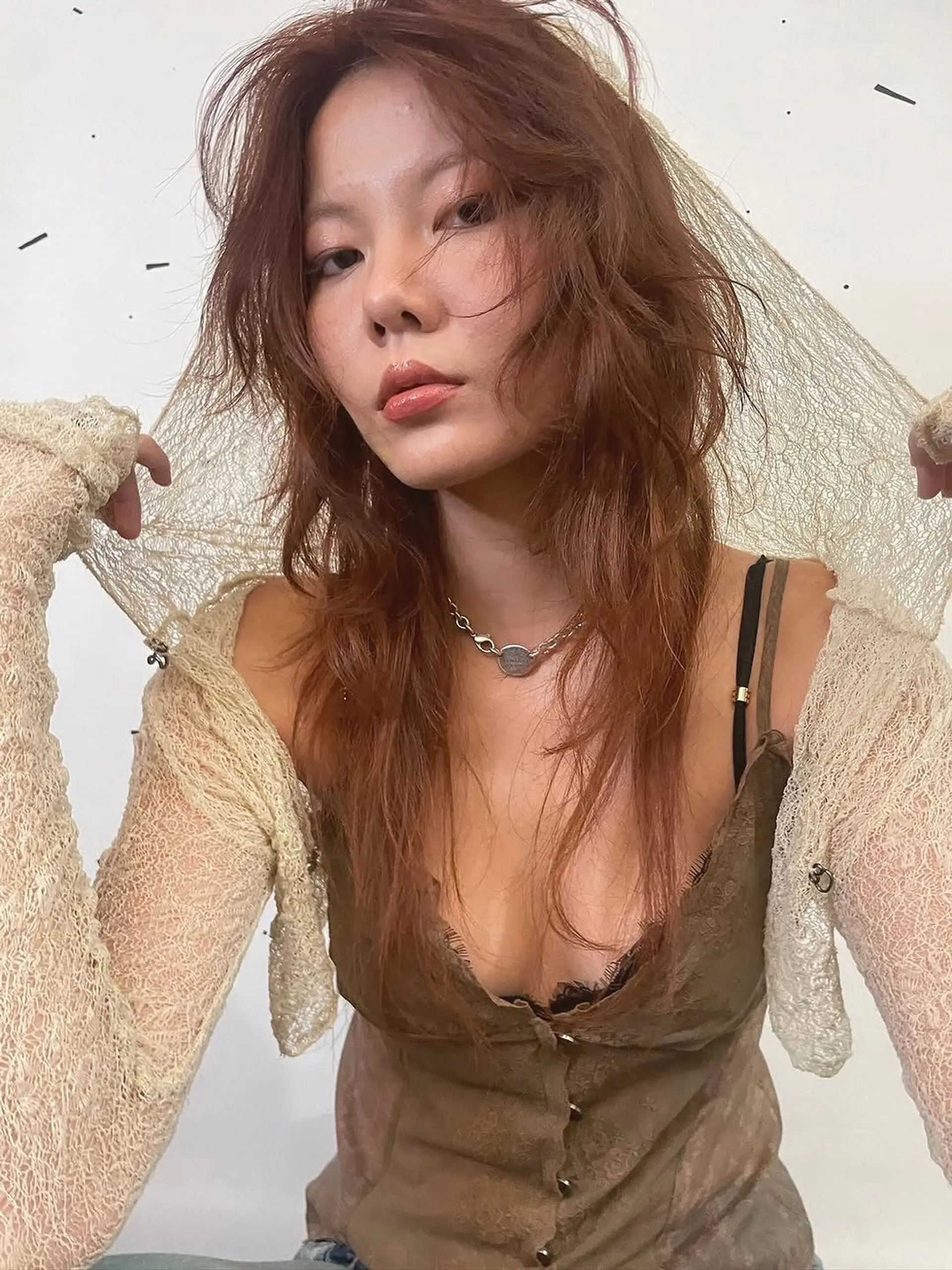 A modern long shag with heavy layering throughout to create volume, movement, and a messy, undone aesthetic. 1