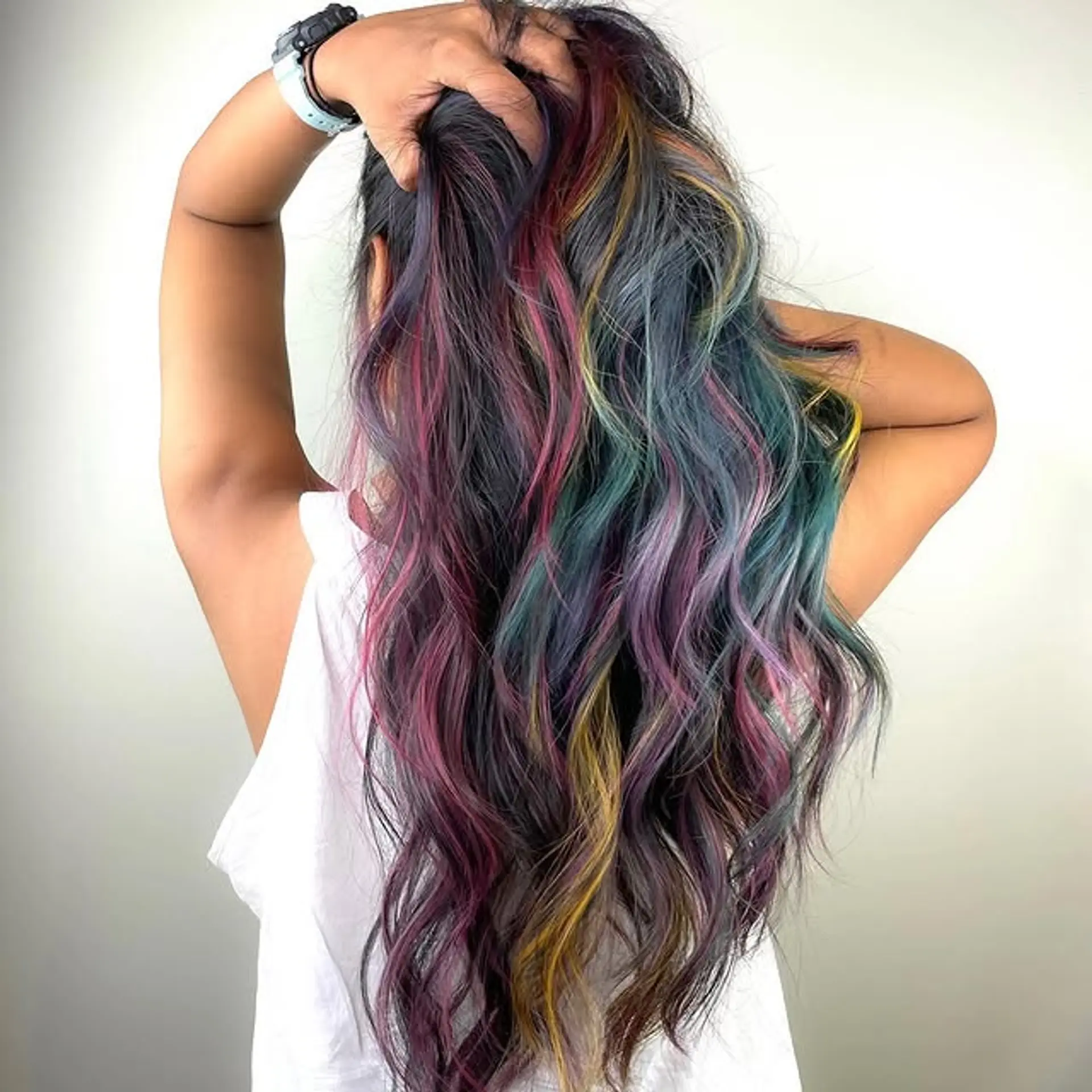 Long, wavy hair with a pastel rainbow color scheme. 1
