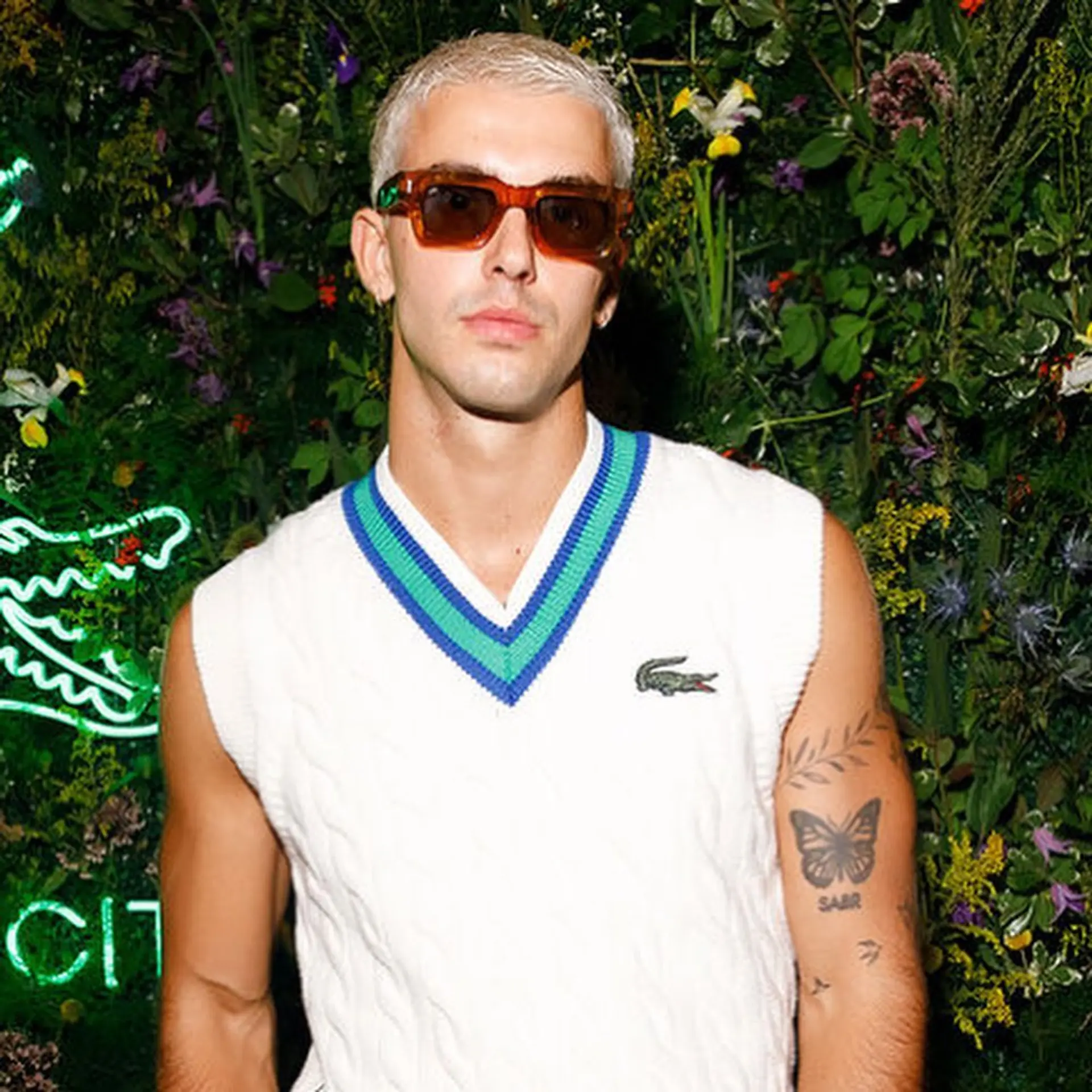 Short platinum bleached buzz cut. 1