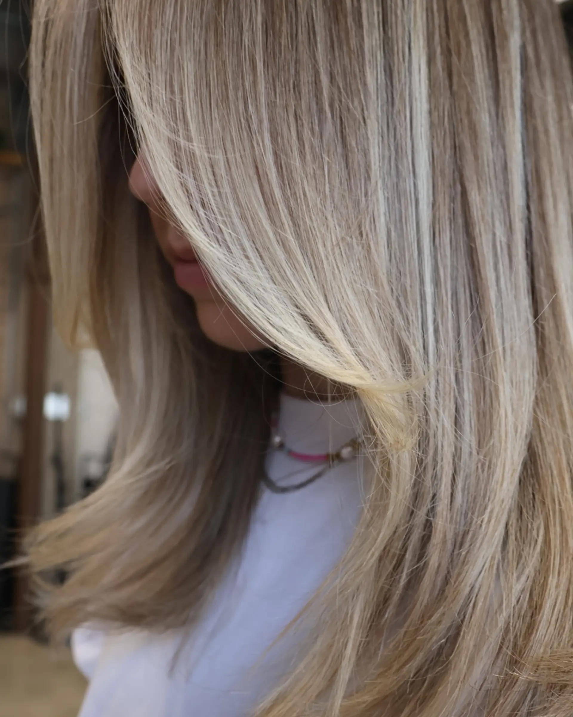 Long layered hairstyle with balayage highlights. 1