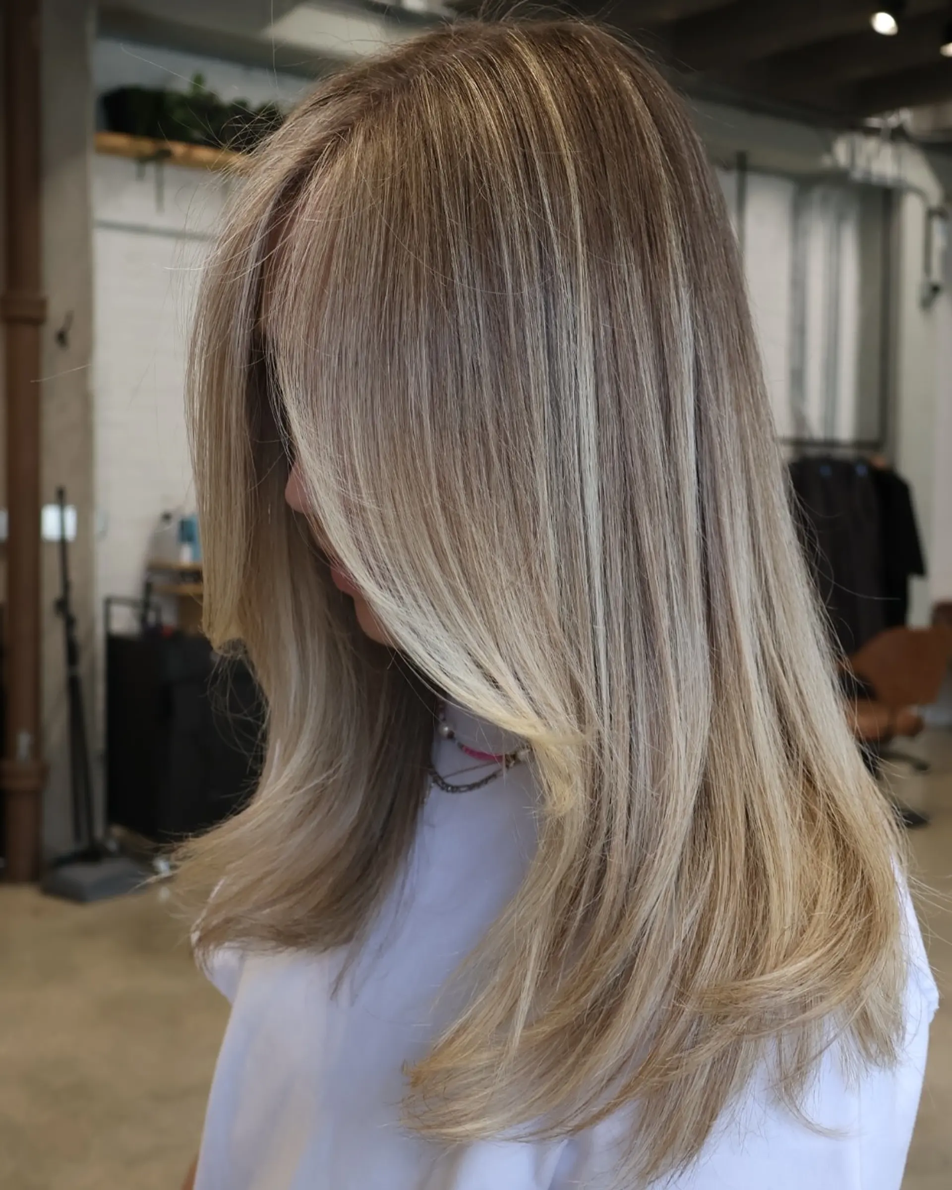 Long layered hairstyle with balayage highlights. 2