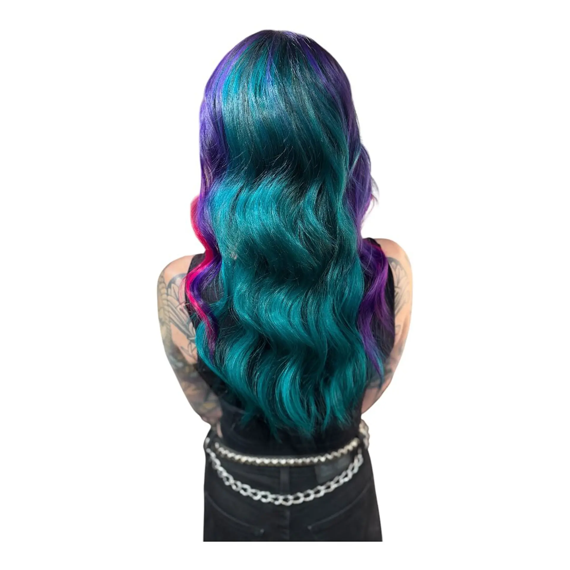 Long wavy hair with a bold vivid color combination of deep teal, purple, and magenta streaks. 1