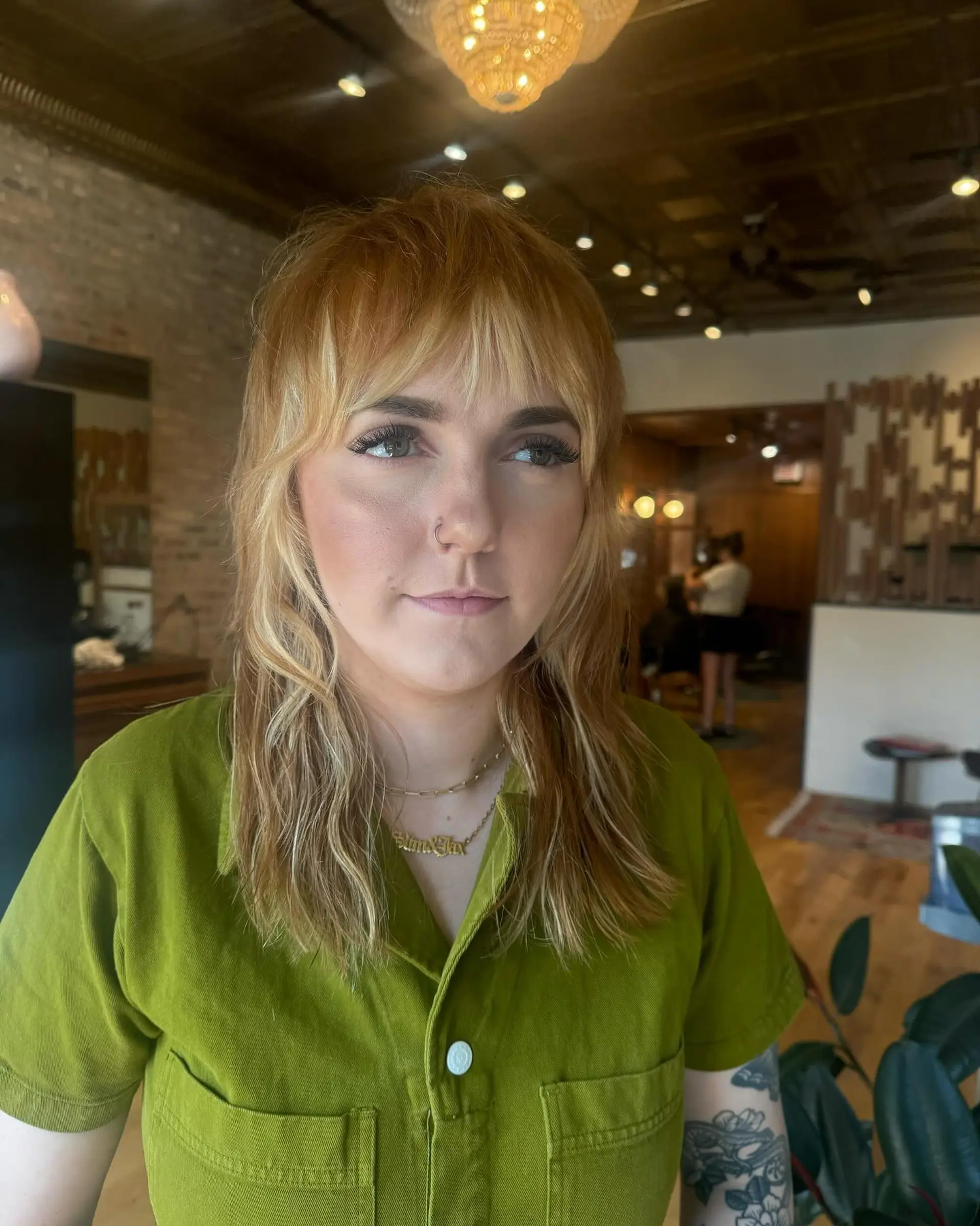 A layered shag with curtain bangs. 1