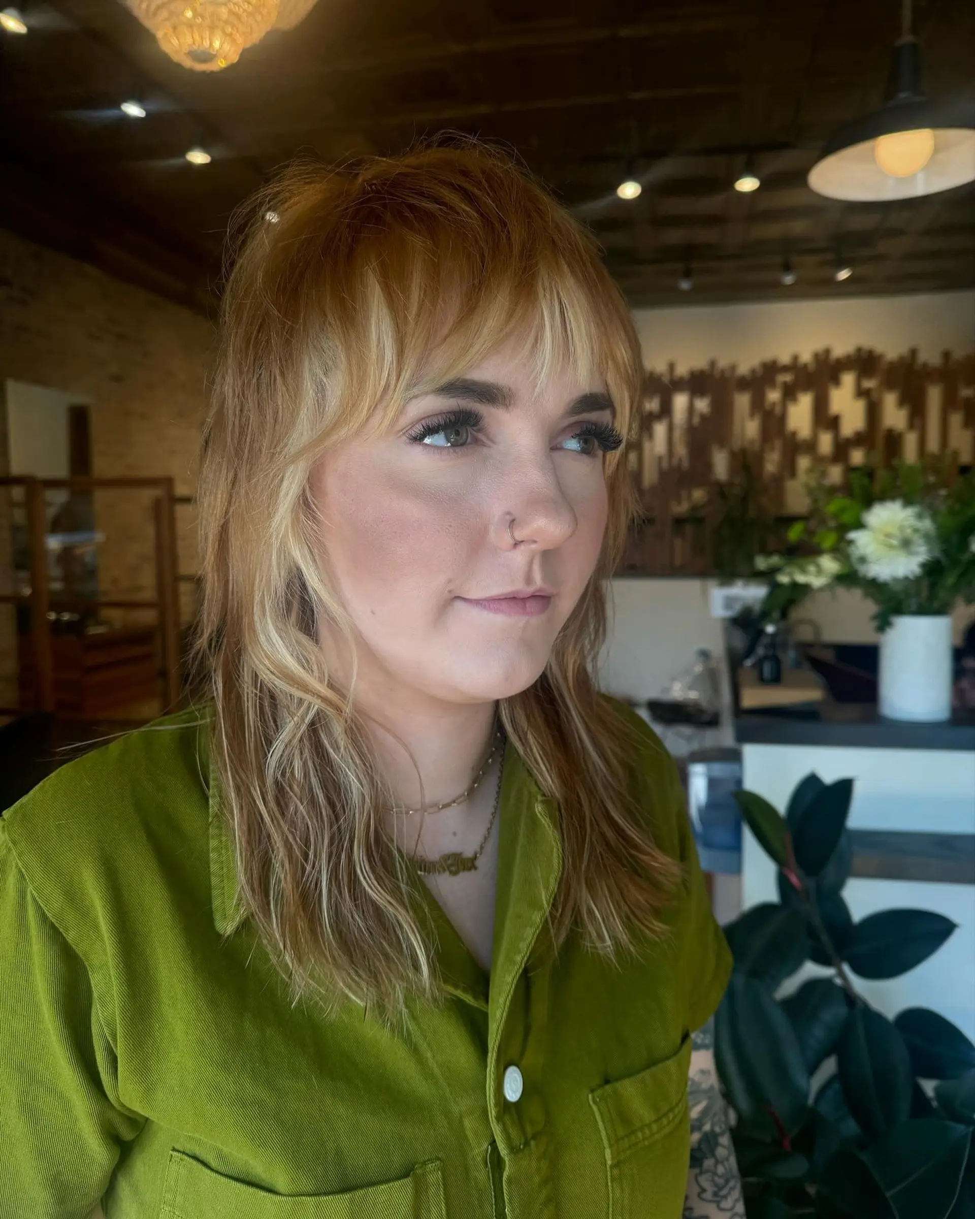 A layered shag with curtain bangs. 2