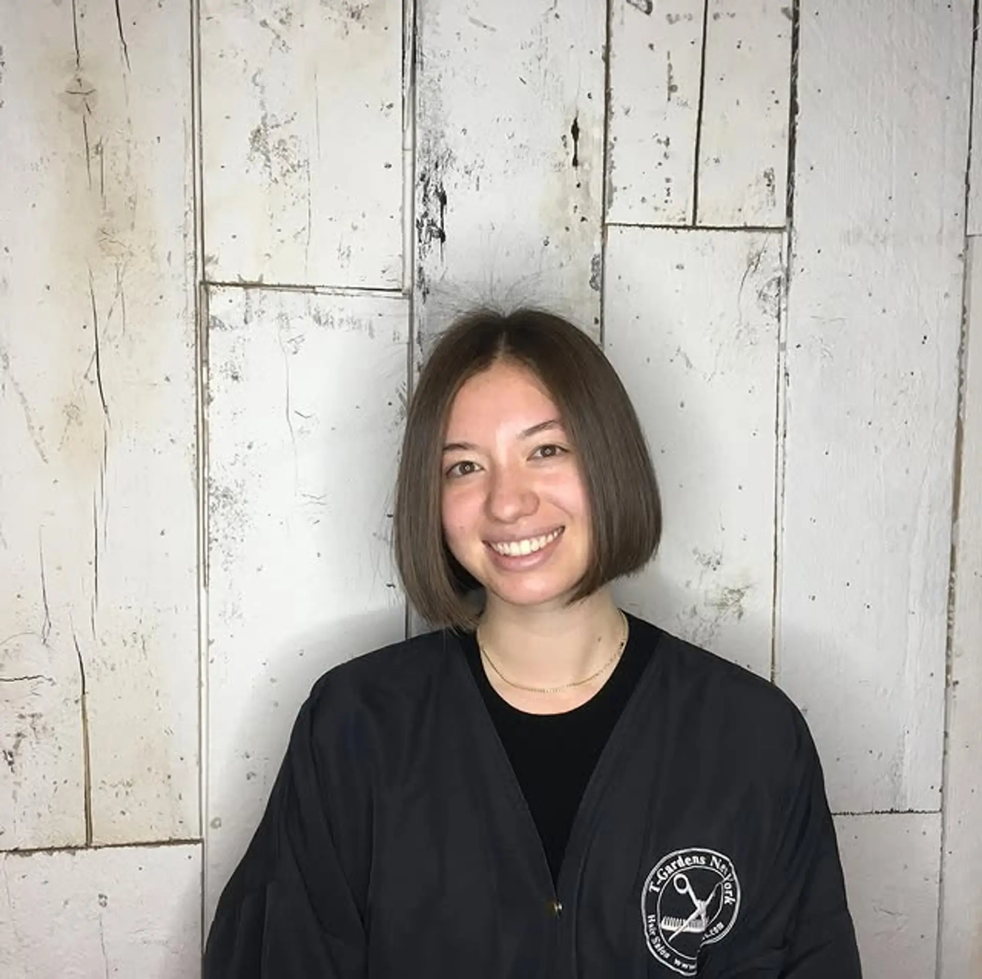 A short, sleek blunt bob with subtle face-framing. 1