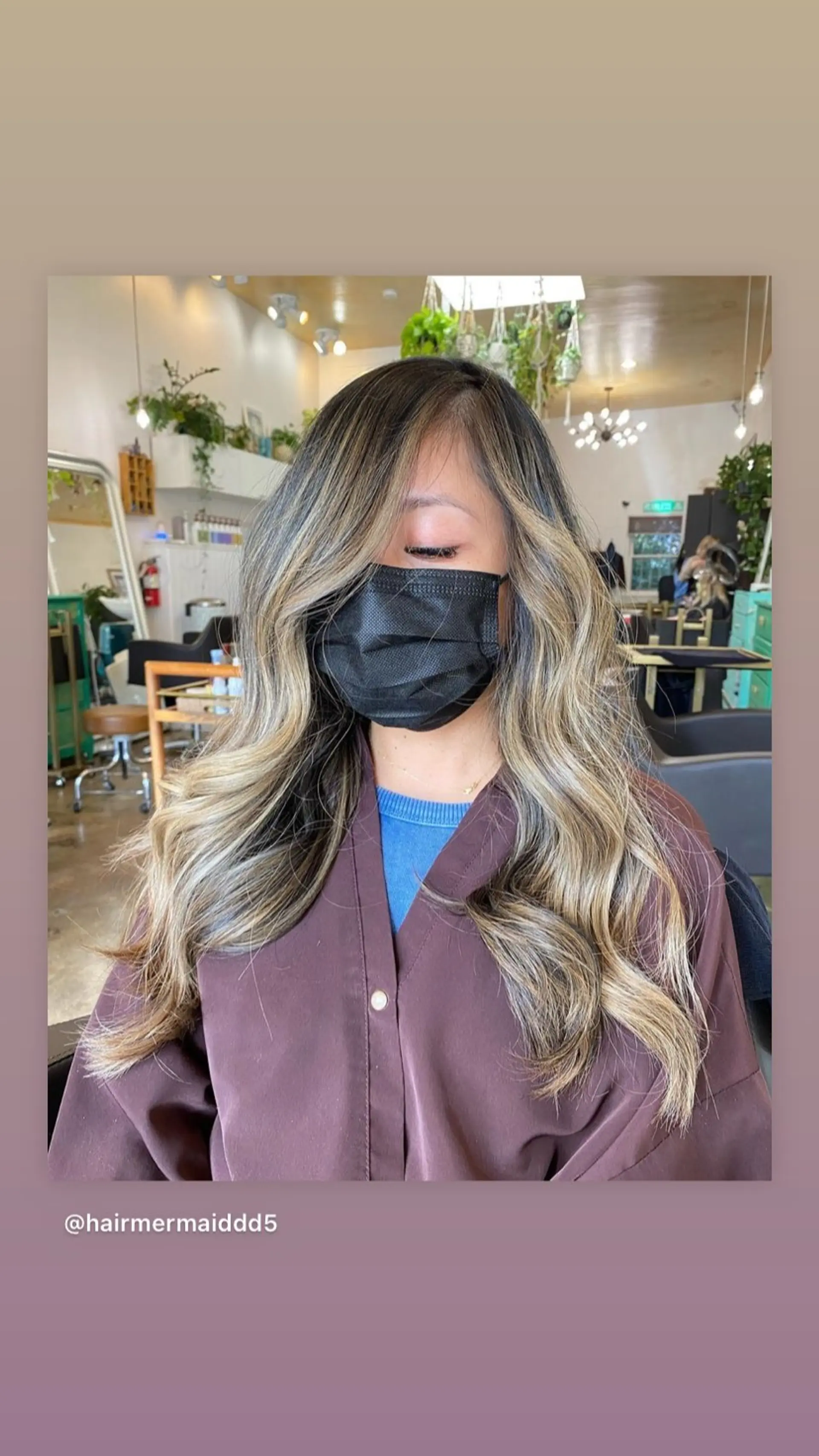 A balayage technique with blended brown and blonde tones and styled with soft waves. 1