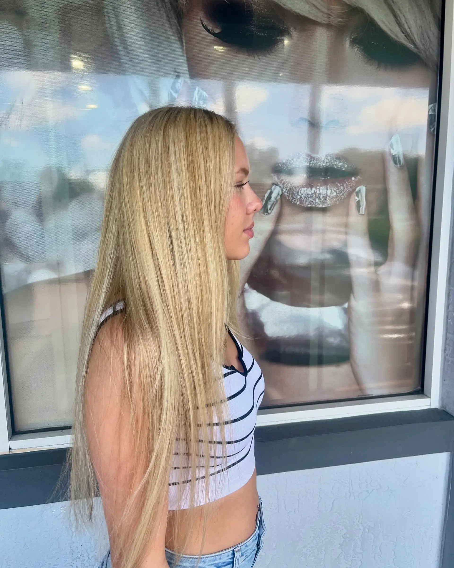 Long, straight blonde hair with subtle layering. 1