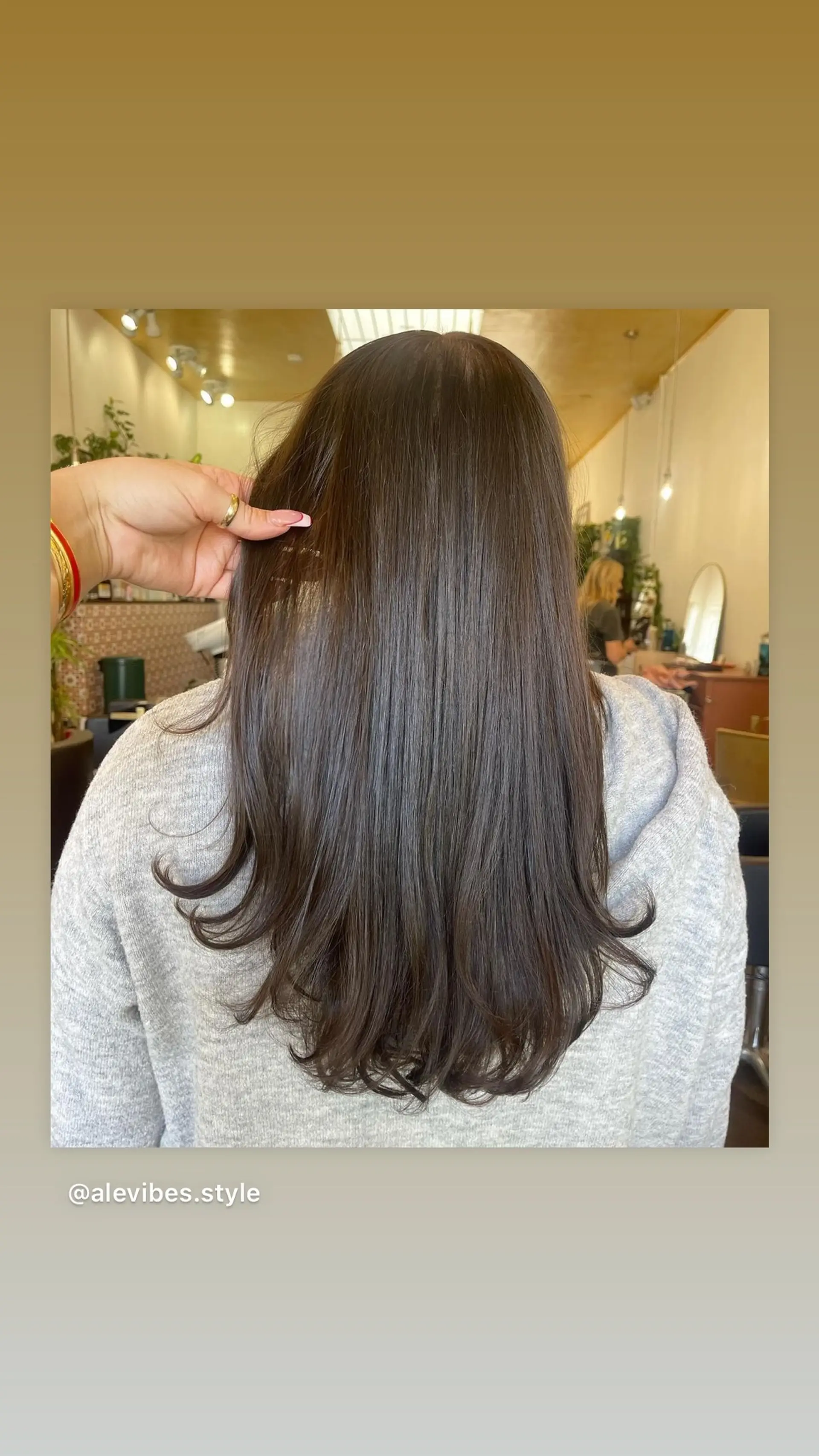 Long, straight hair with subtle face-framing layers. 1