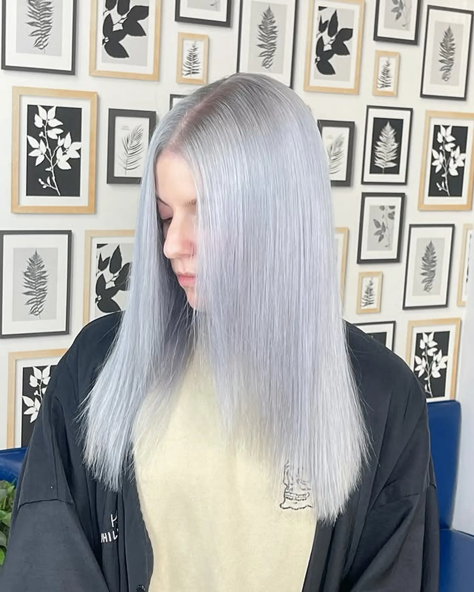 A sleek, straight, medium-length hairstyle in an icy blue-silver shade. 1