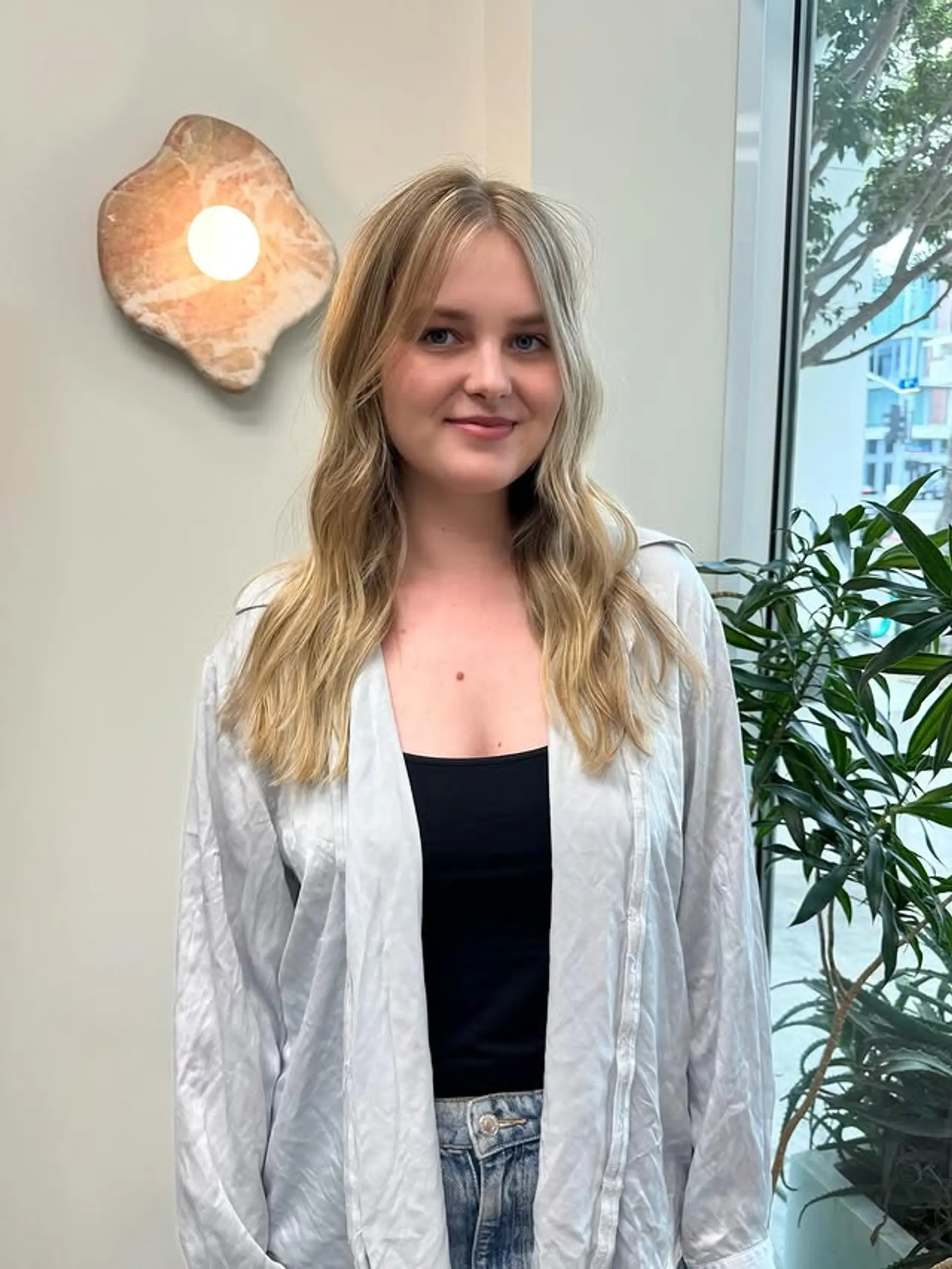 Medium length beachy waves with flattering face-framing layers. 1