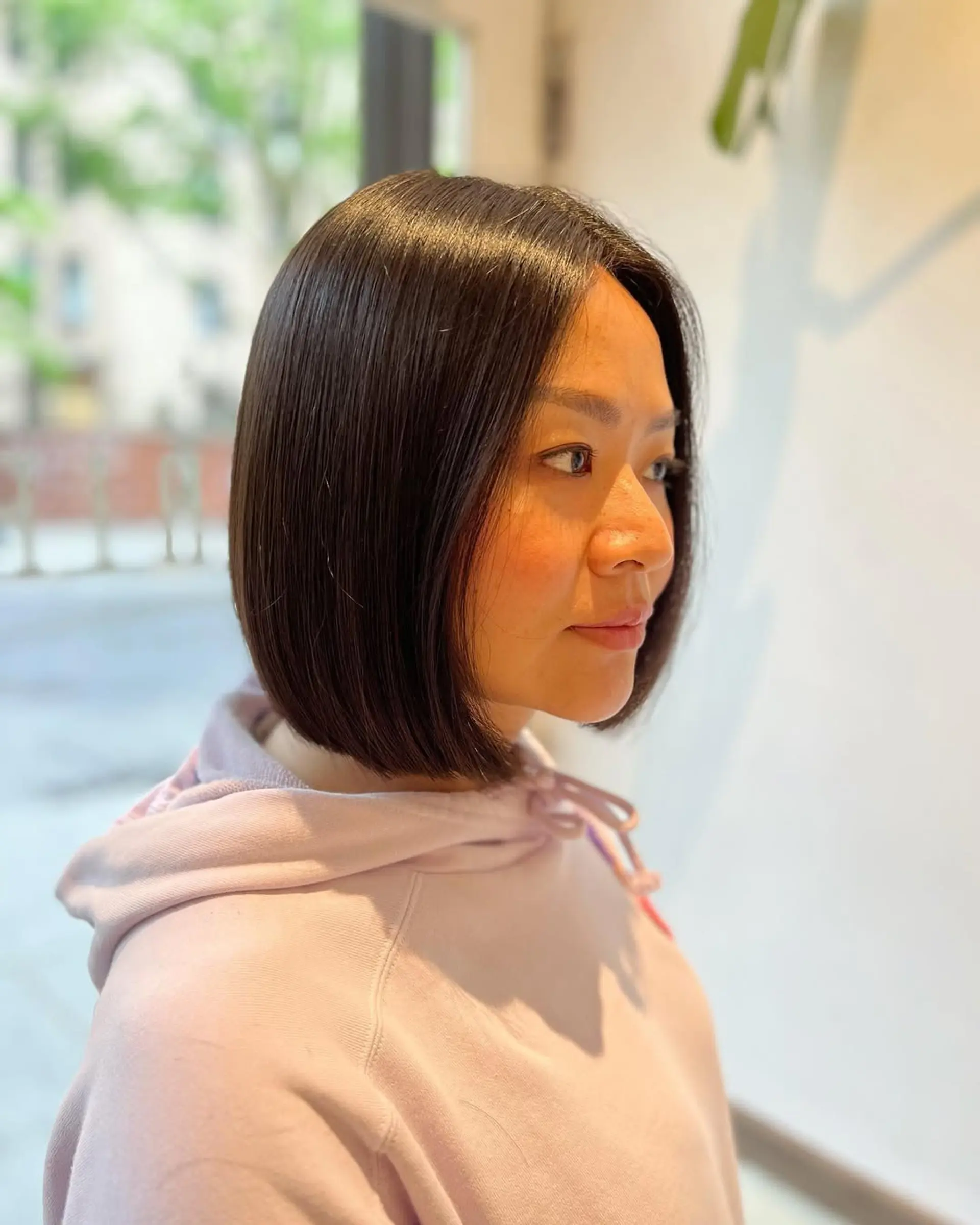 A chin-length bob with a sleek and polished finish. 1