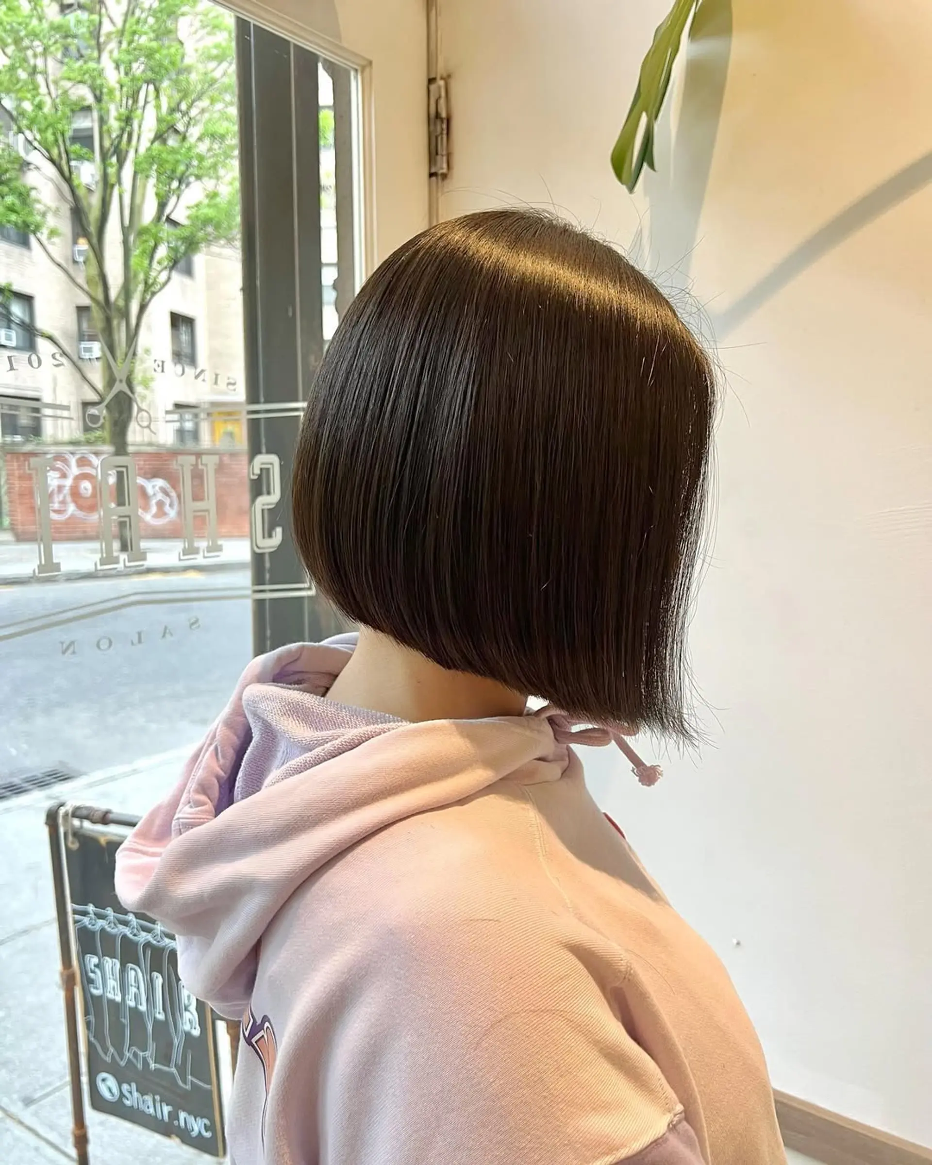 A chin-length bob with a sleek and polished finish. 2