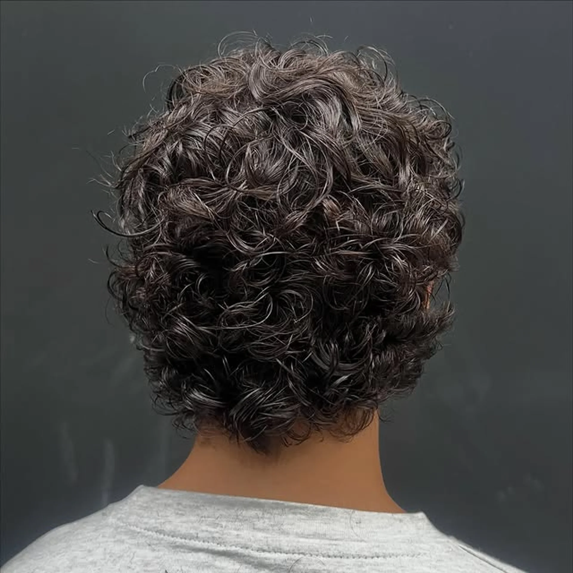 A medium-length curly bob with voluminous natural curls. - Preview 2