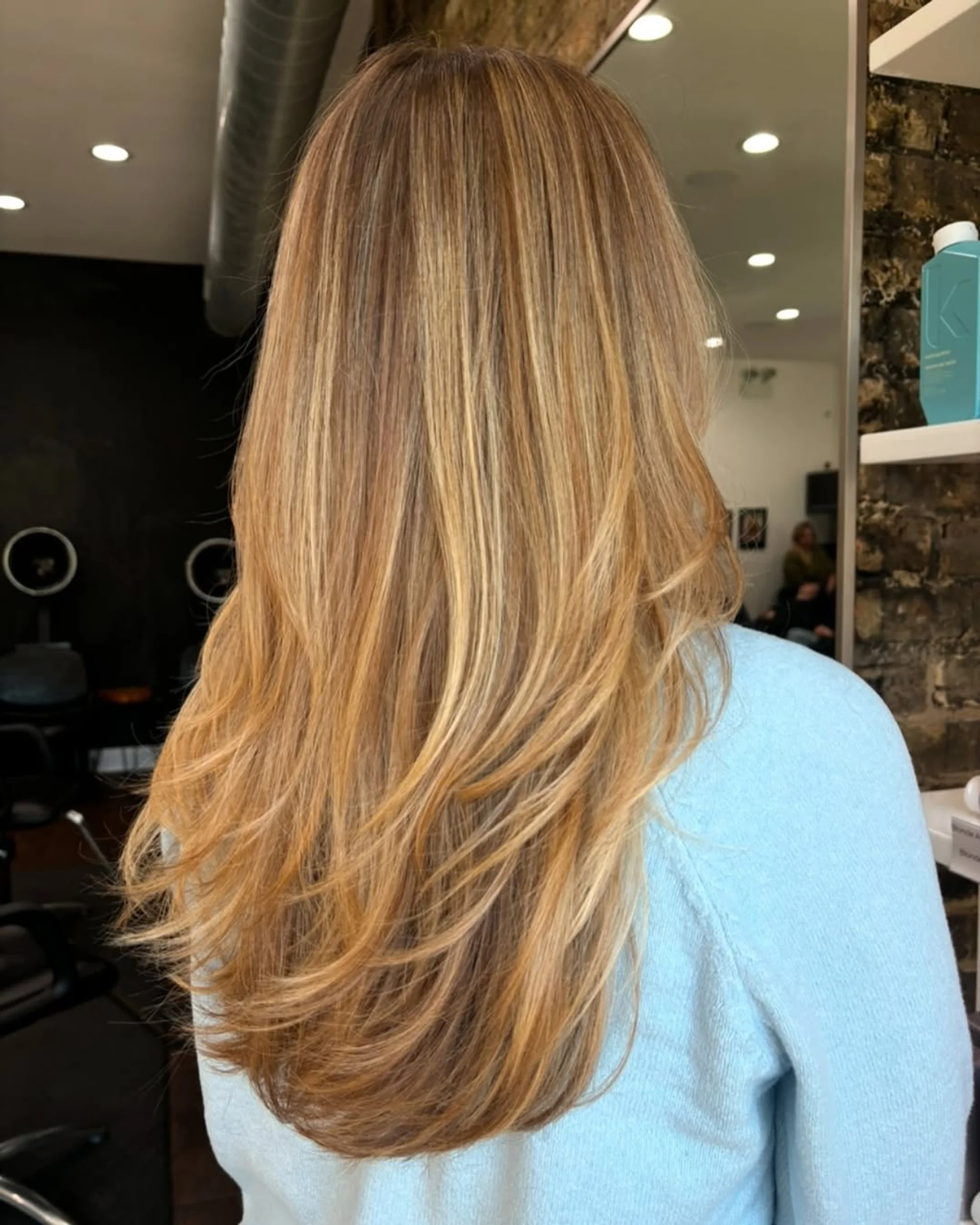 A voluminous long layered butterfly cut showcasing perfect interior ghost layers and wavy volume - Preview 2