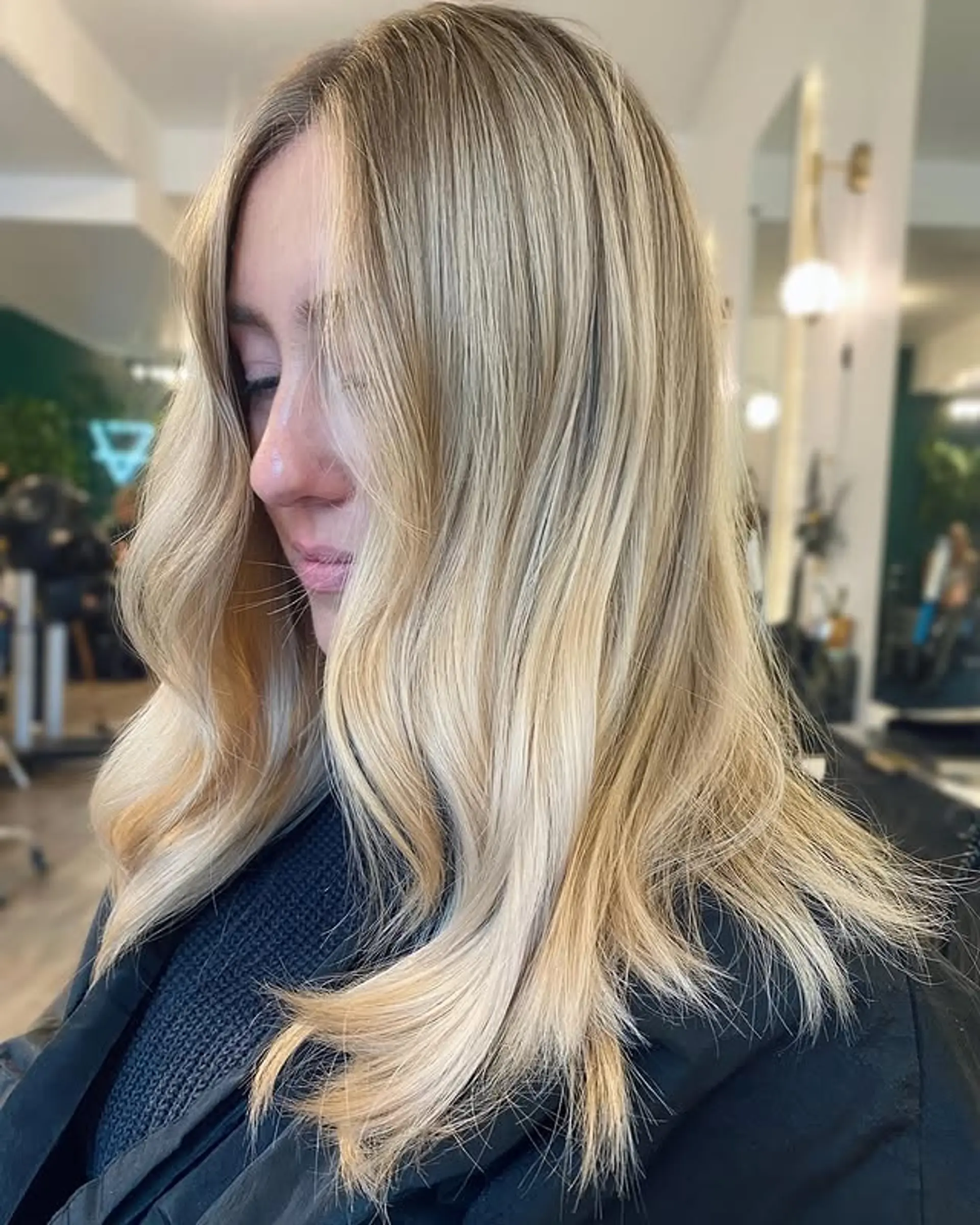 A medium-length lob with soft, beachy waves and a balayage color technique. 1
