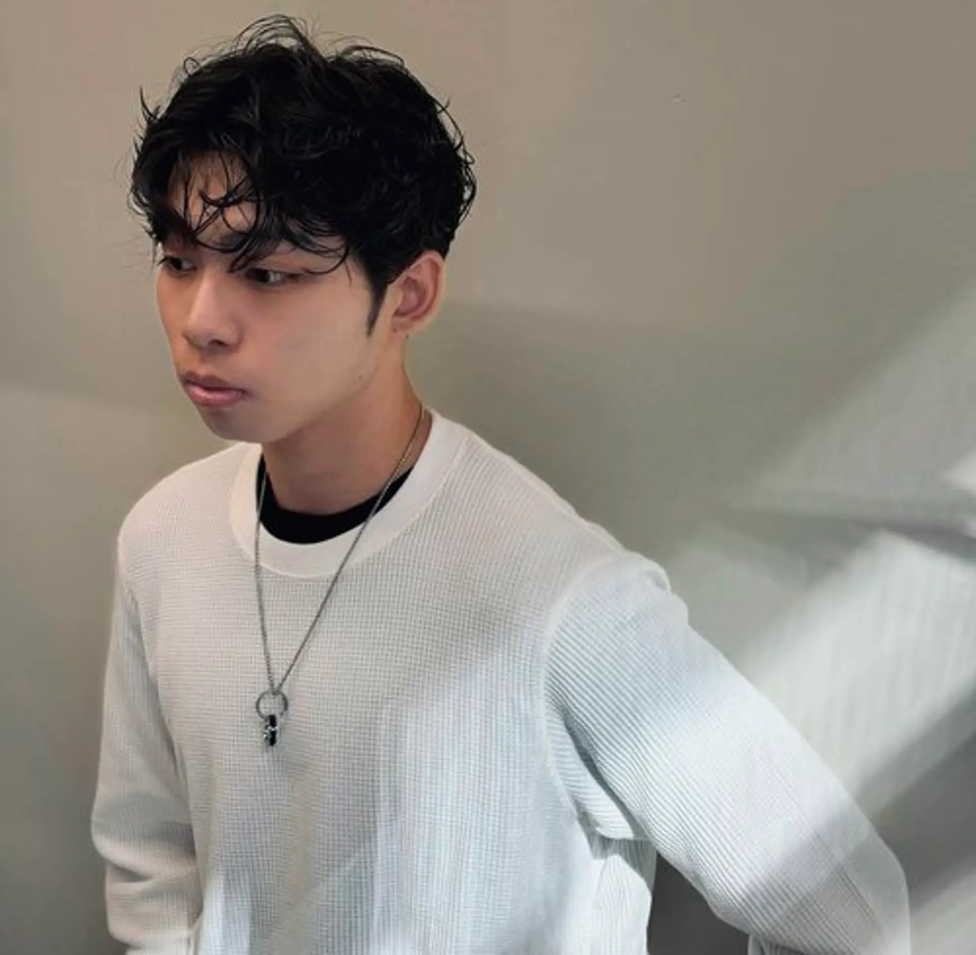 A textured perm with soft, natural-looking waves. 1