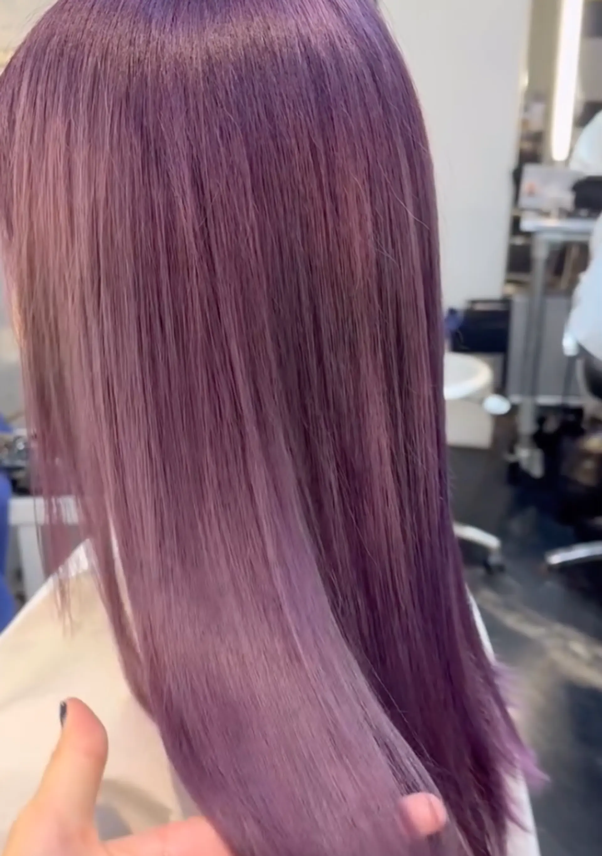 Medium-length, straight hair with a vibrant purple hue, smooth finish, and a layered cut.

Stylist: @yurihair.newyork 1