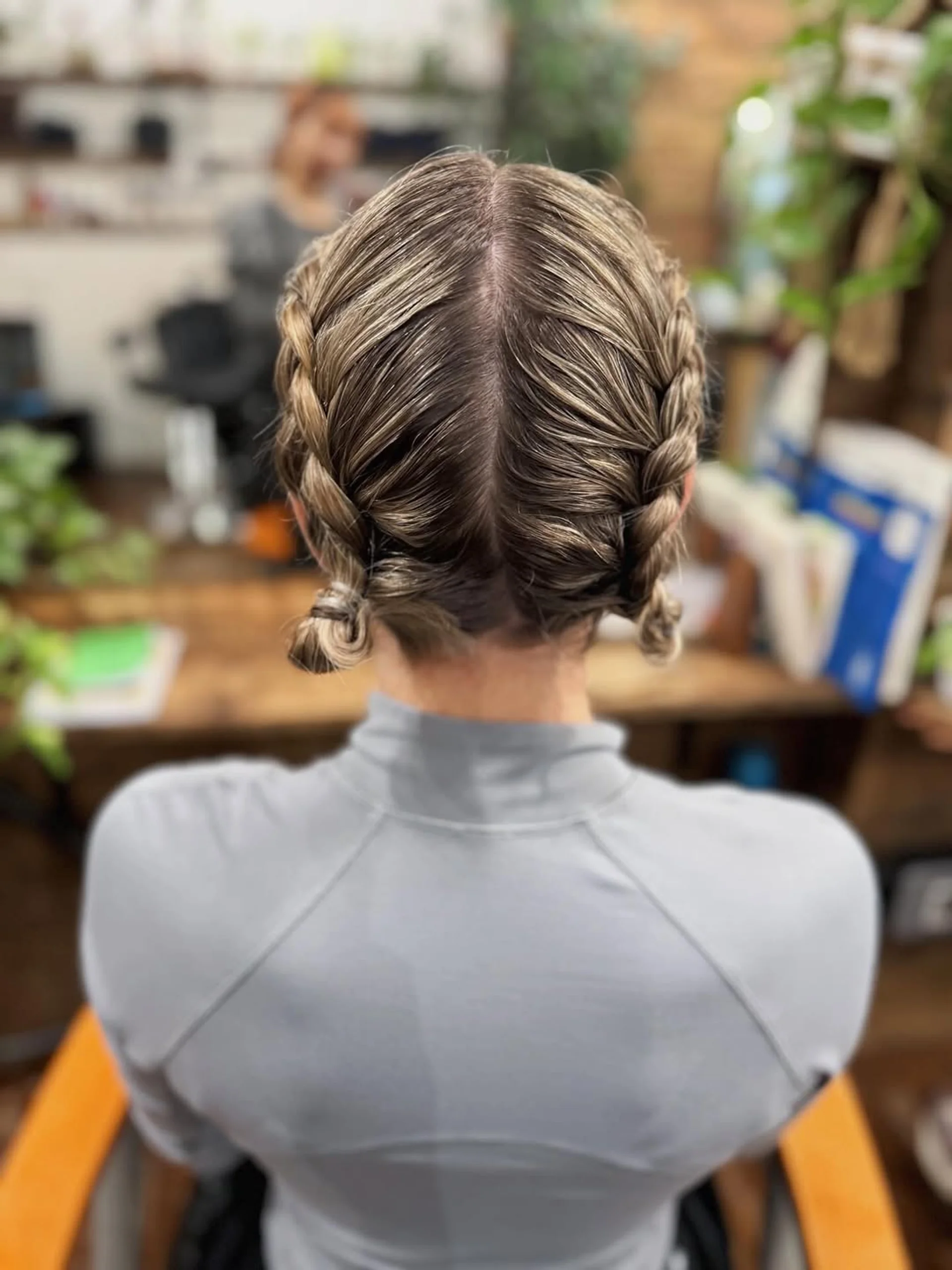 Playful double braids featuring vibrant neon pink streaks - Preview 1