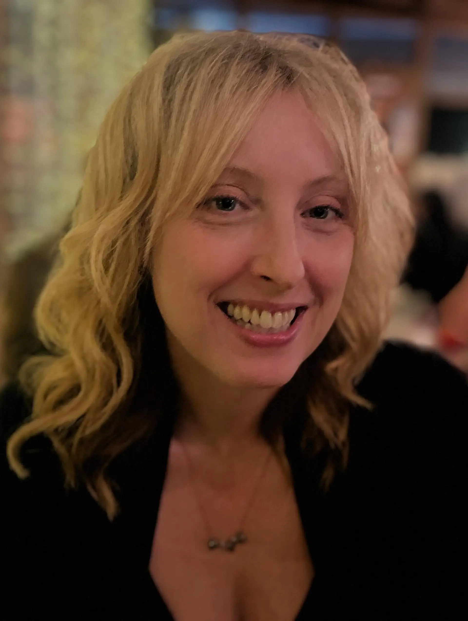 A modern shag haircut with textured layers and bangs. 5