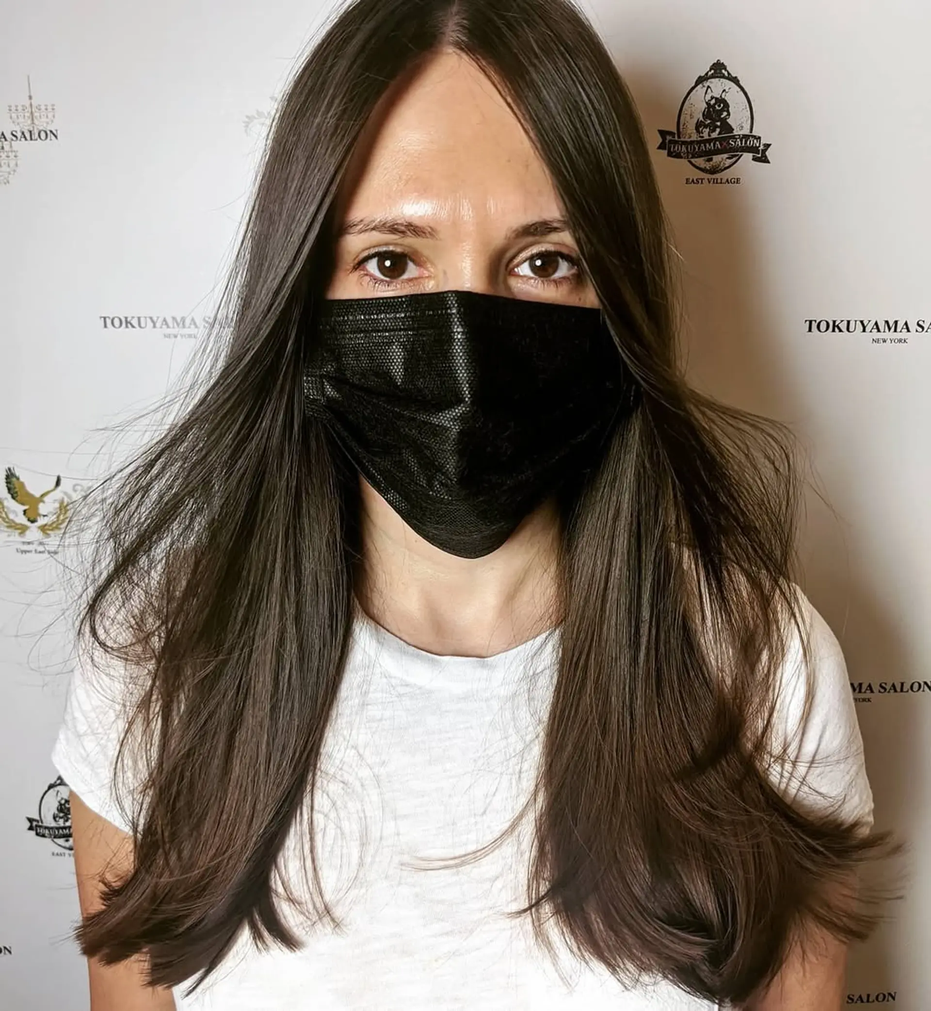 A long, dark brown hairstyle with straight textures. It features a center part, subtle layers, and a smooth, natural sheen. 1