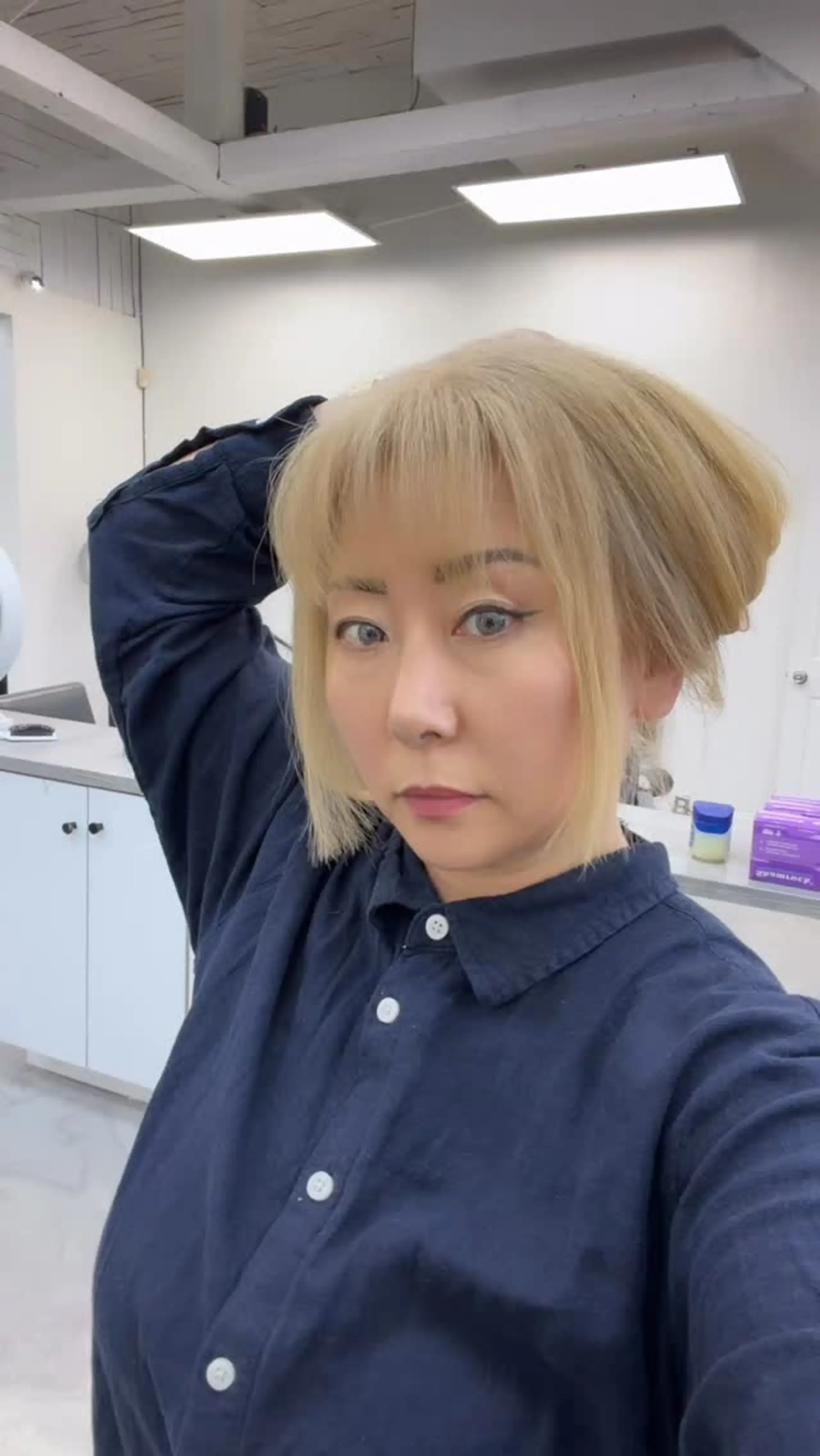 Light blonde hime haircut featuring blunt jaw-length side sections and soft, eyebrow-skimming bangs. 1