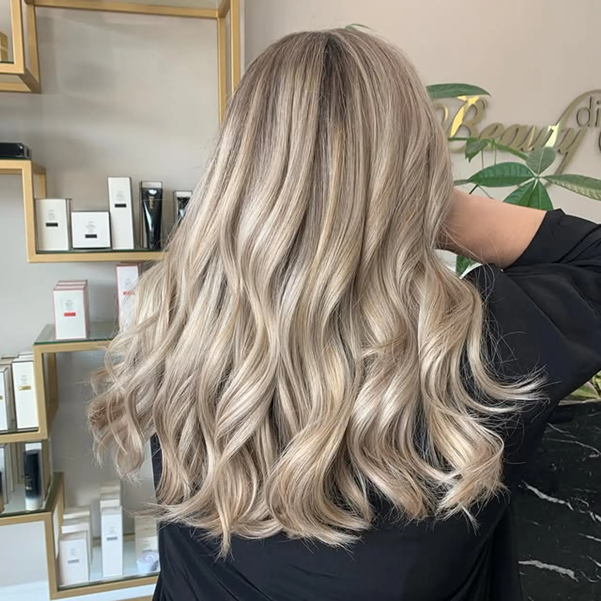 Long, wavy hair with balayage and ash blonde highlights. 1