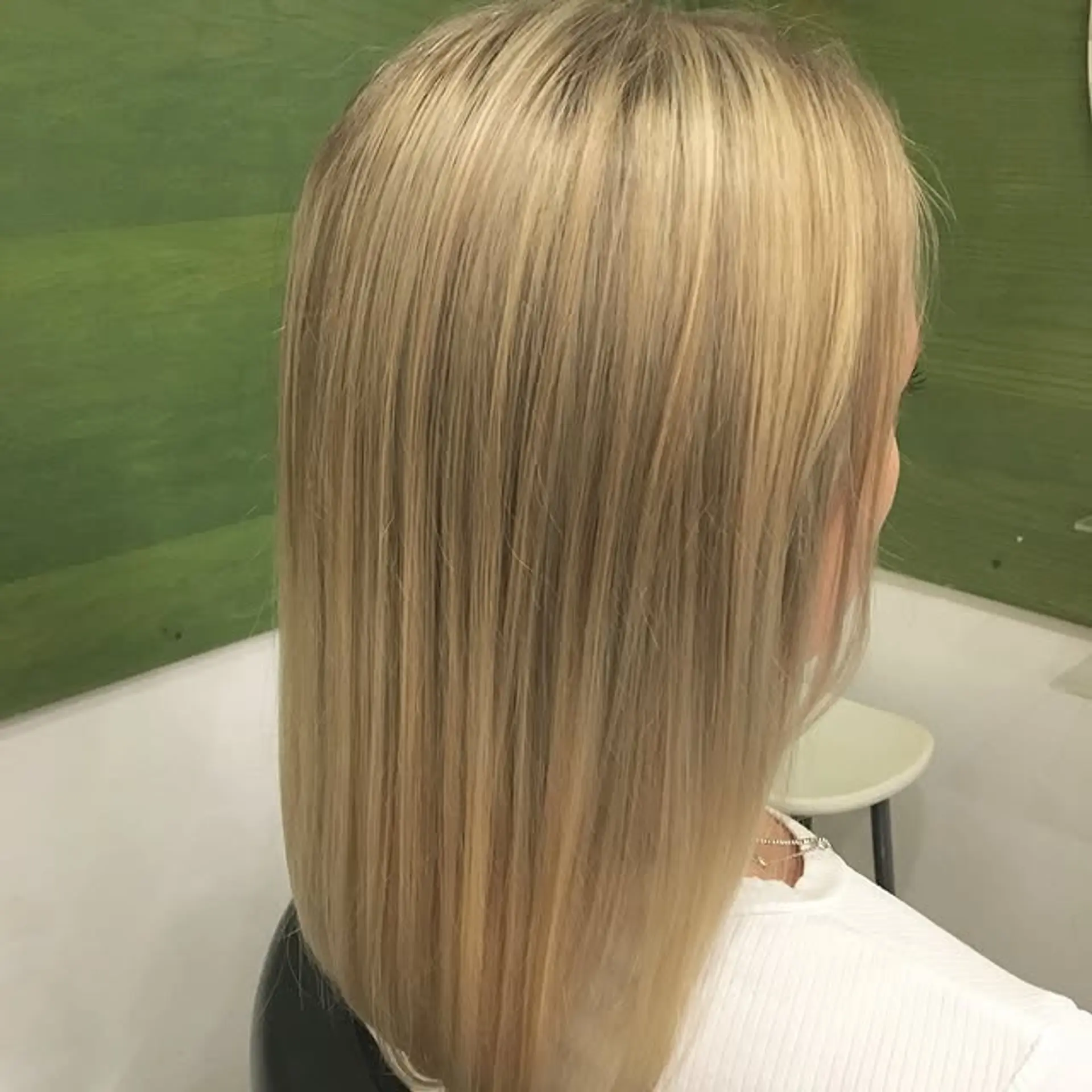A sleek and modern medium-length long bob with straight hair. 1