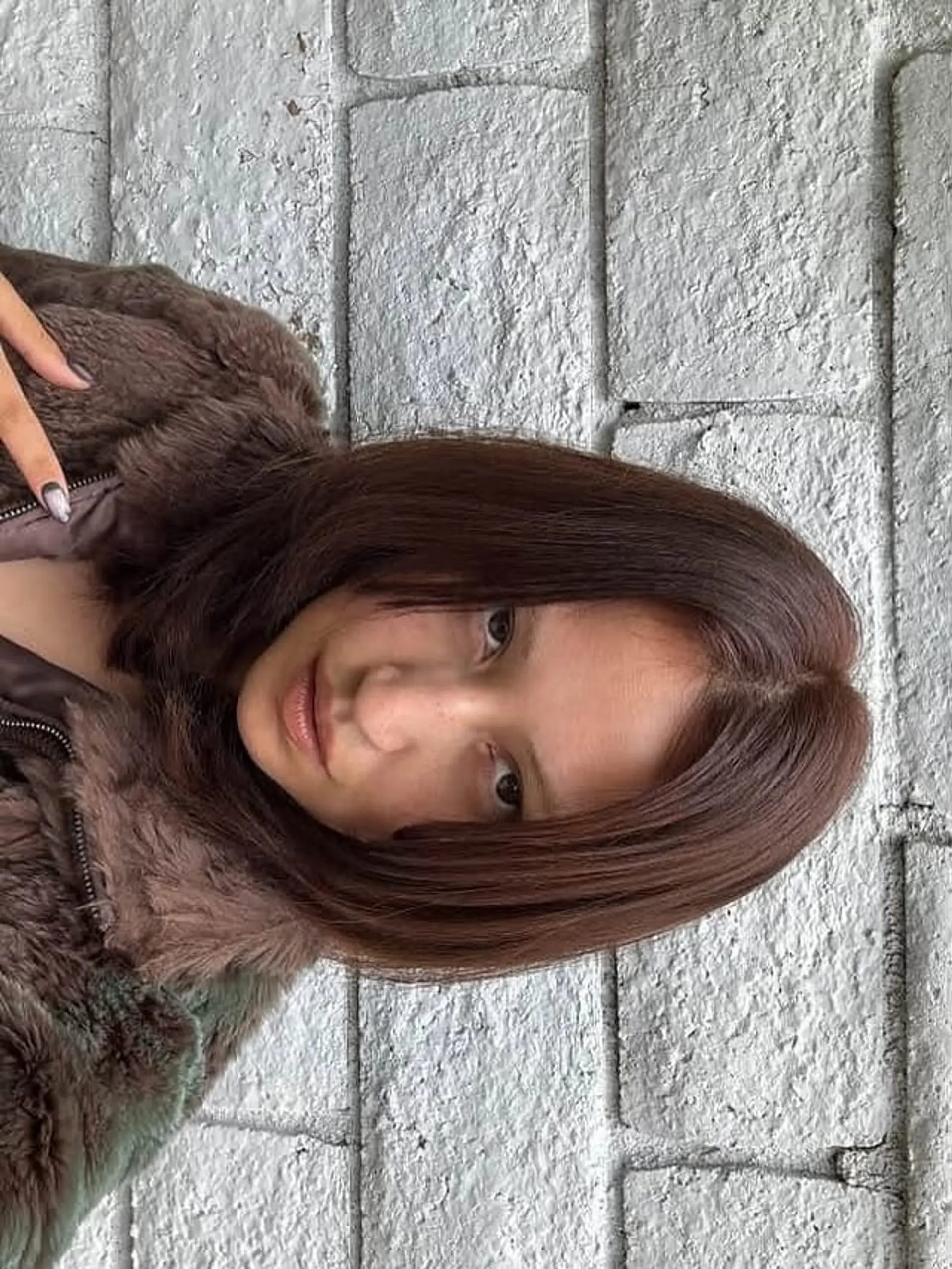 A medium length straight bob haircut. 1