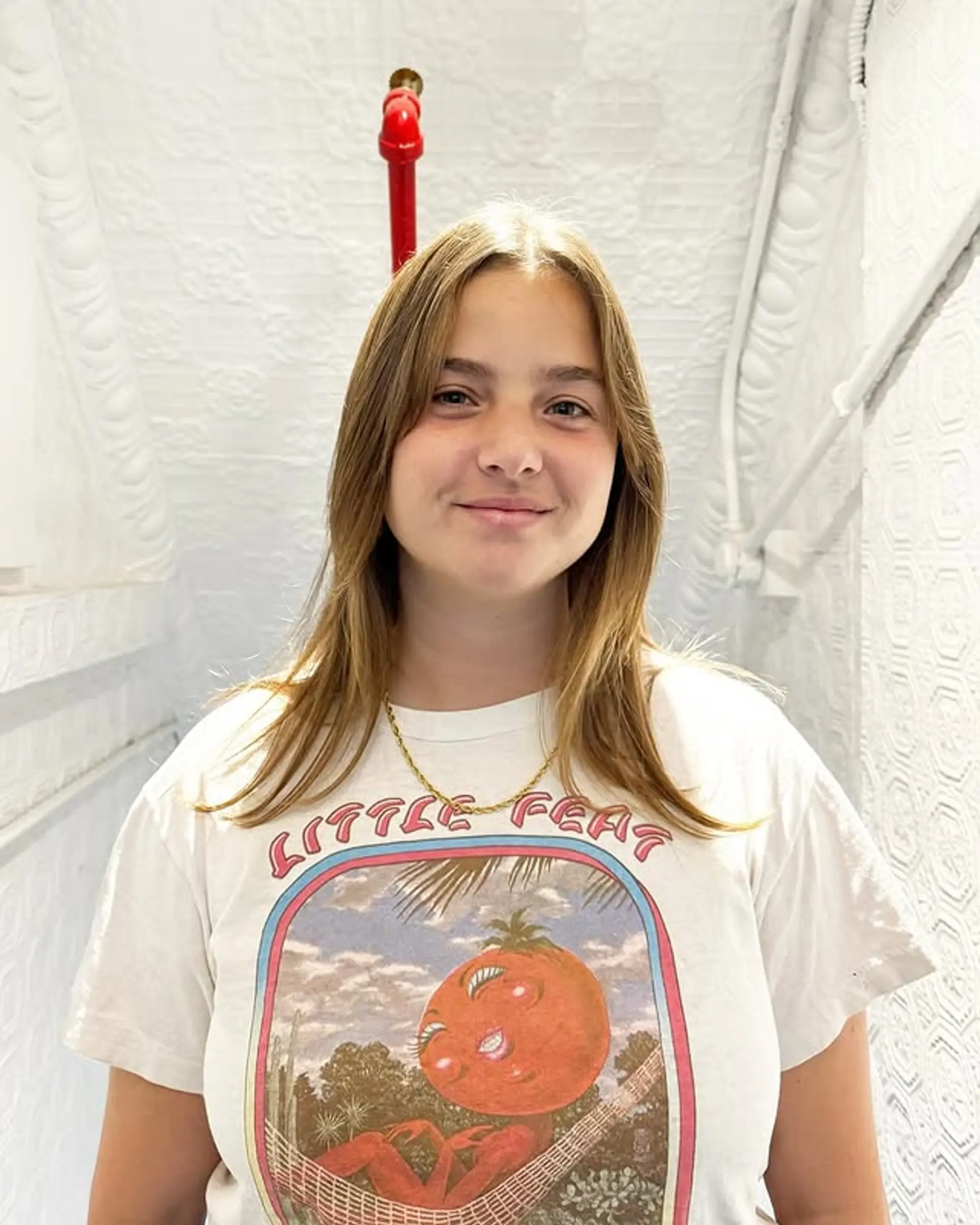 Shaggy layers with face-framing curtain bangs, parted in the center for a relaxed, trendy style. 1