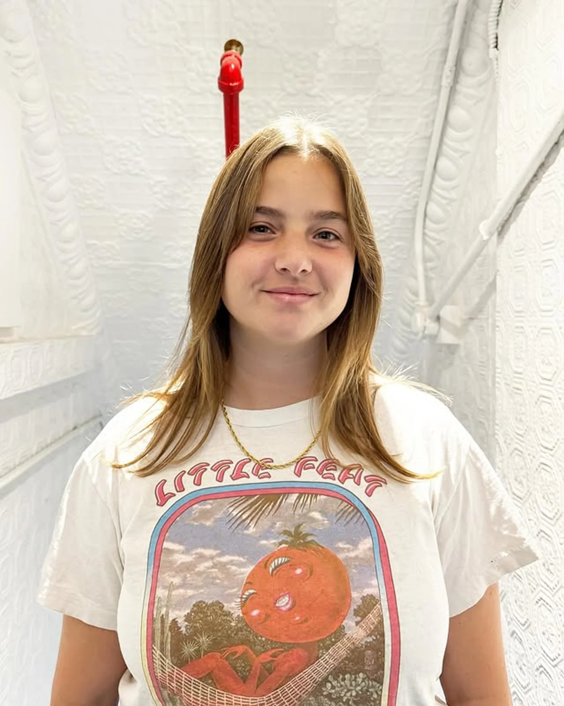 A modern shag haircut with choppy layers and trendy curtain bangs, embodying personalized style. - Preview 1