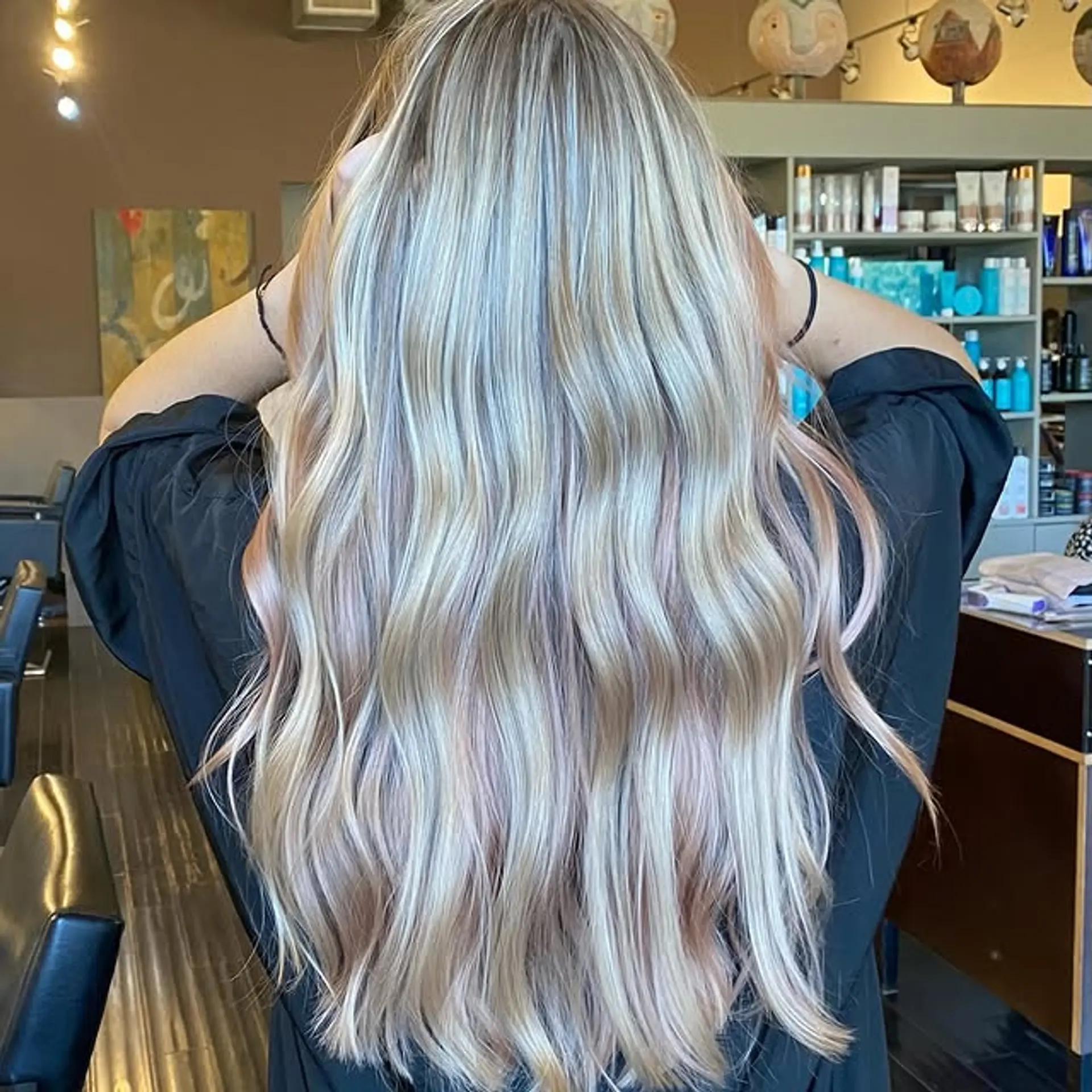 Long, wavy balayage with icy blonde, light brown, and pink hues. 1