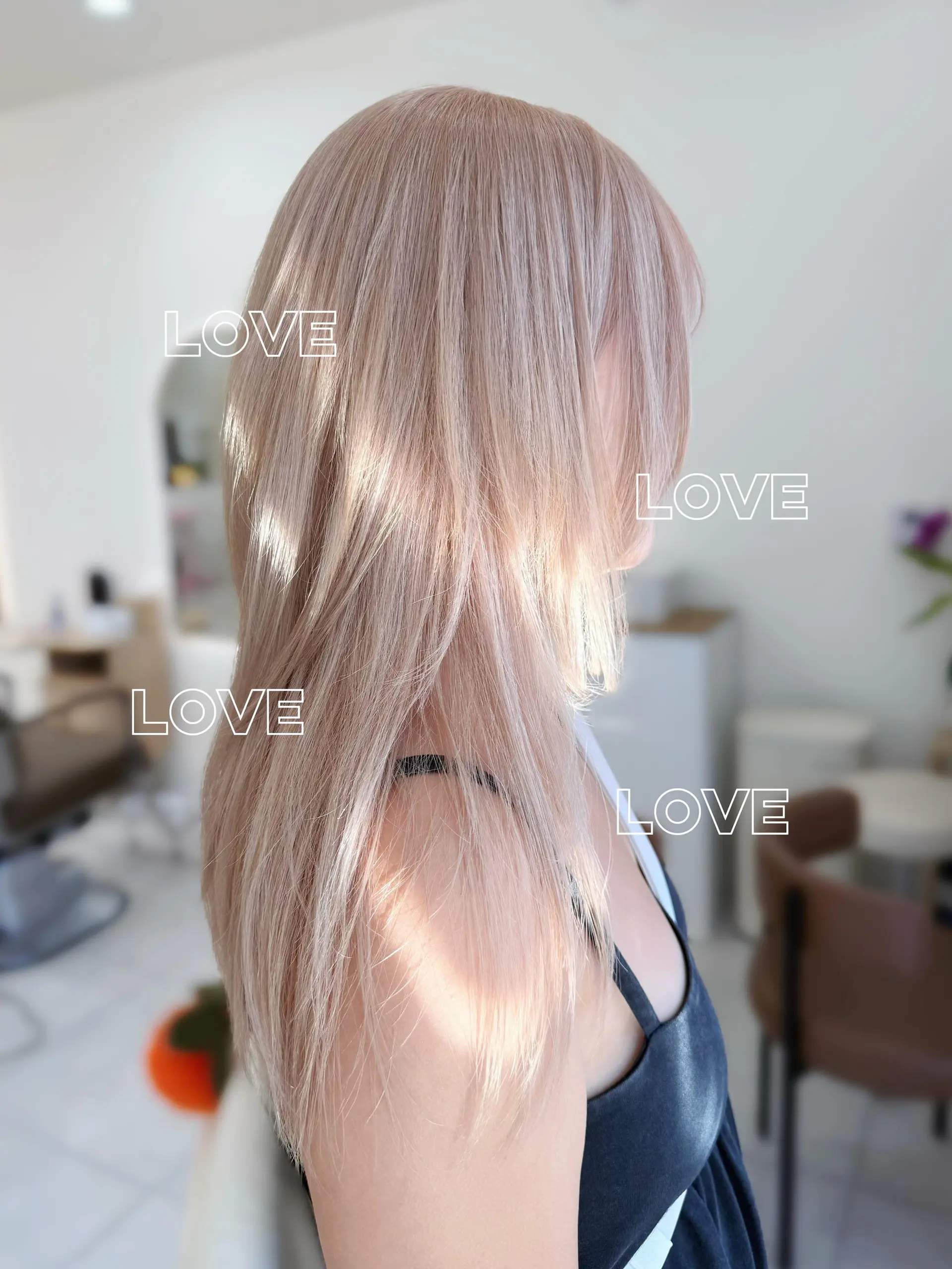 A sleek, long straight hairstyle featuring an ultra-light mahogany gold blonde shade with delicate face-framing layers. 1