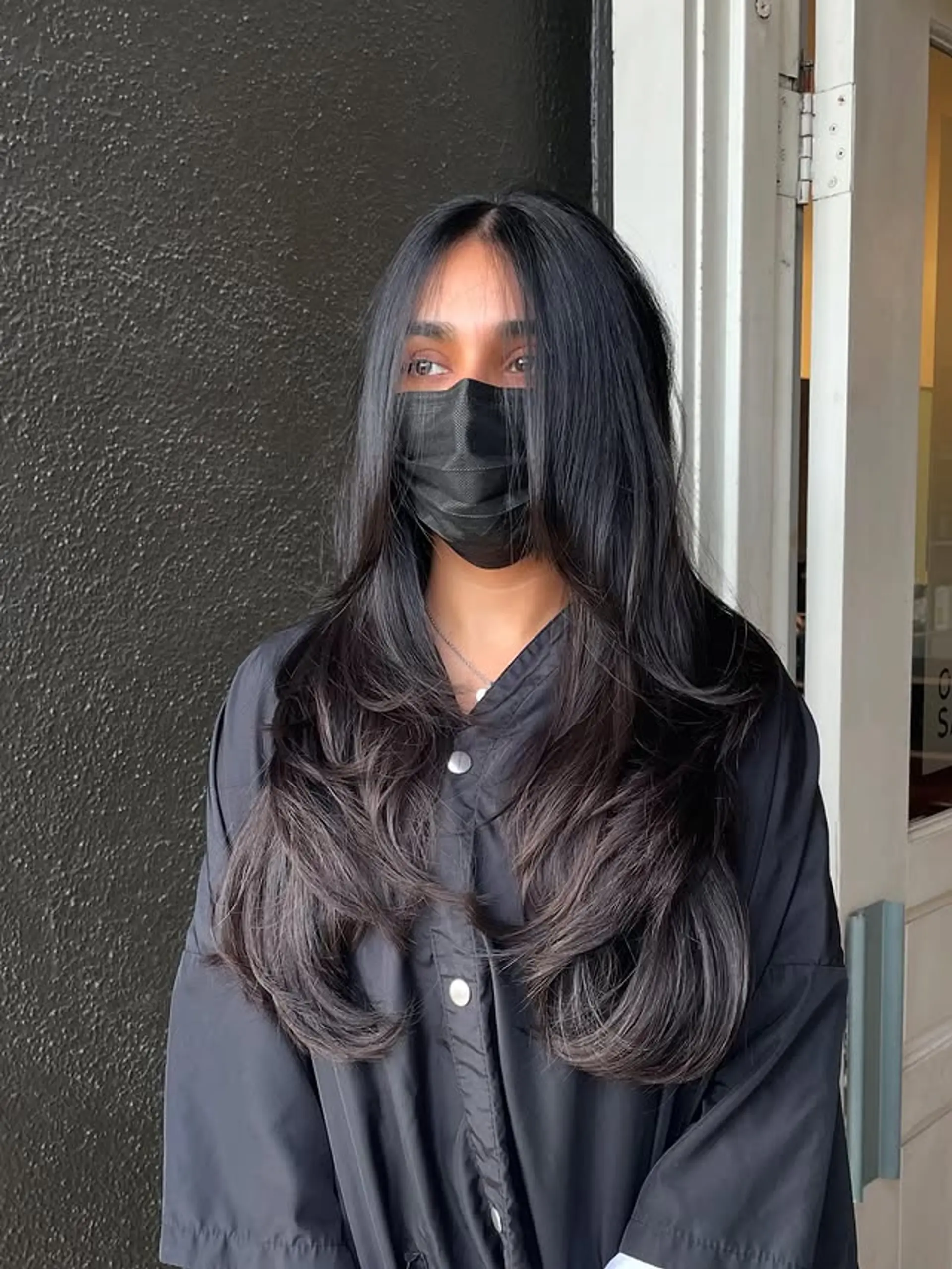 Long layered haircut with a dark ombre. 1