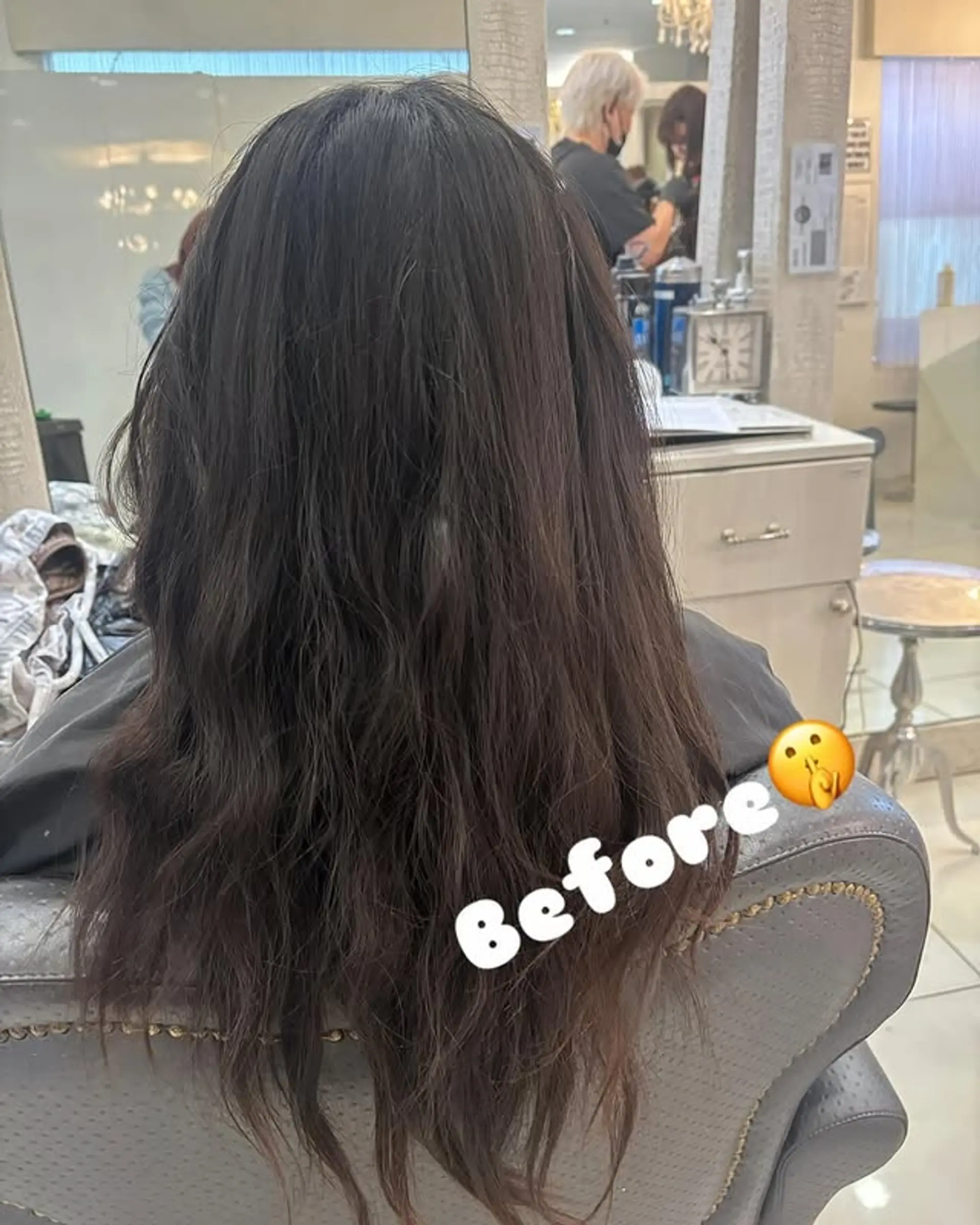 Long layered haircut with wavy texture. 1