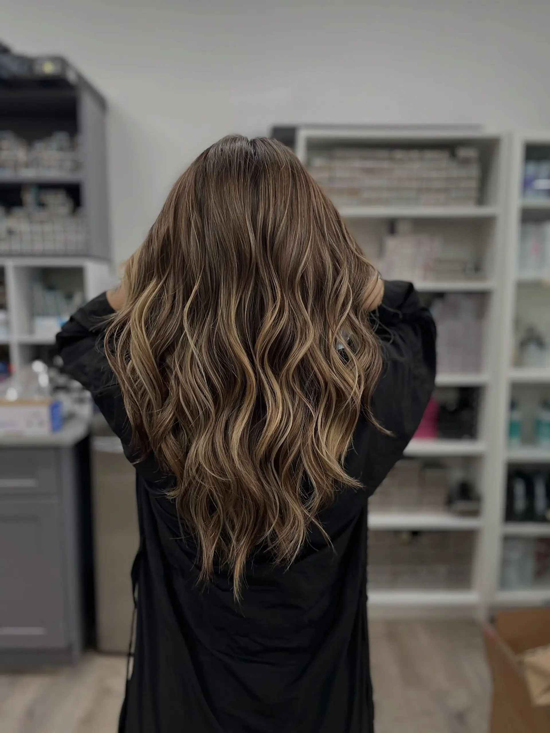 Bronde beach waves are a popular hairstyle that combines brown and blonde tones with loose, natural-looking waves. 2