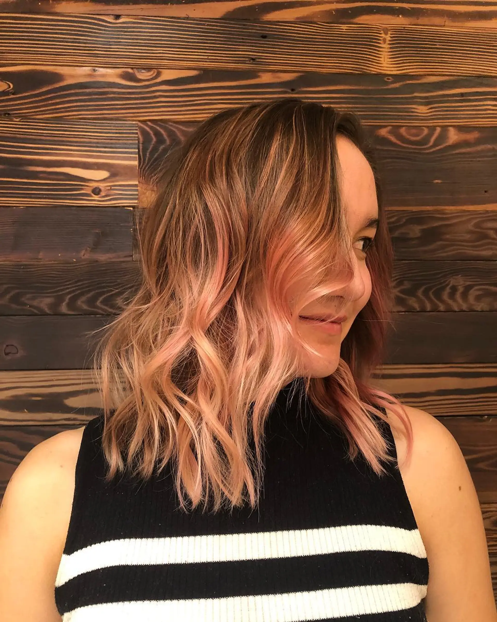 A stylish medium-length bob with loose waves and a stunning rose gold ombre effect. 1