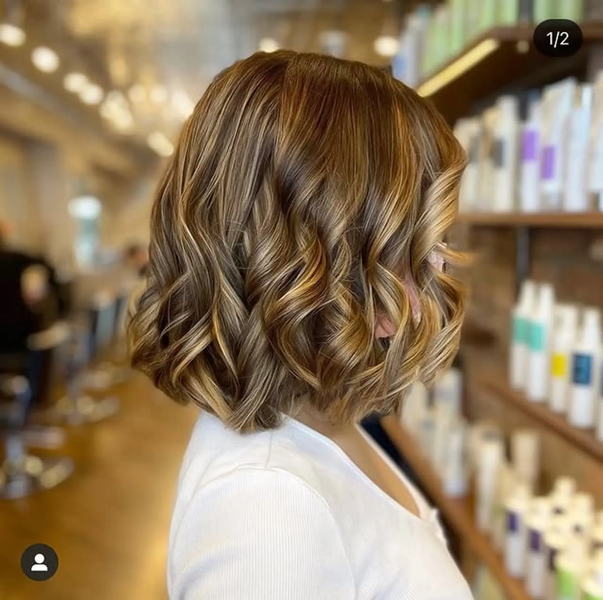A wavy bob with a modern balayage color melt. 1