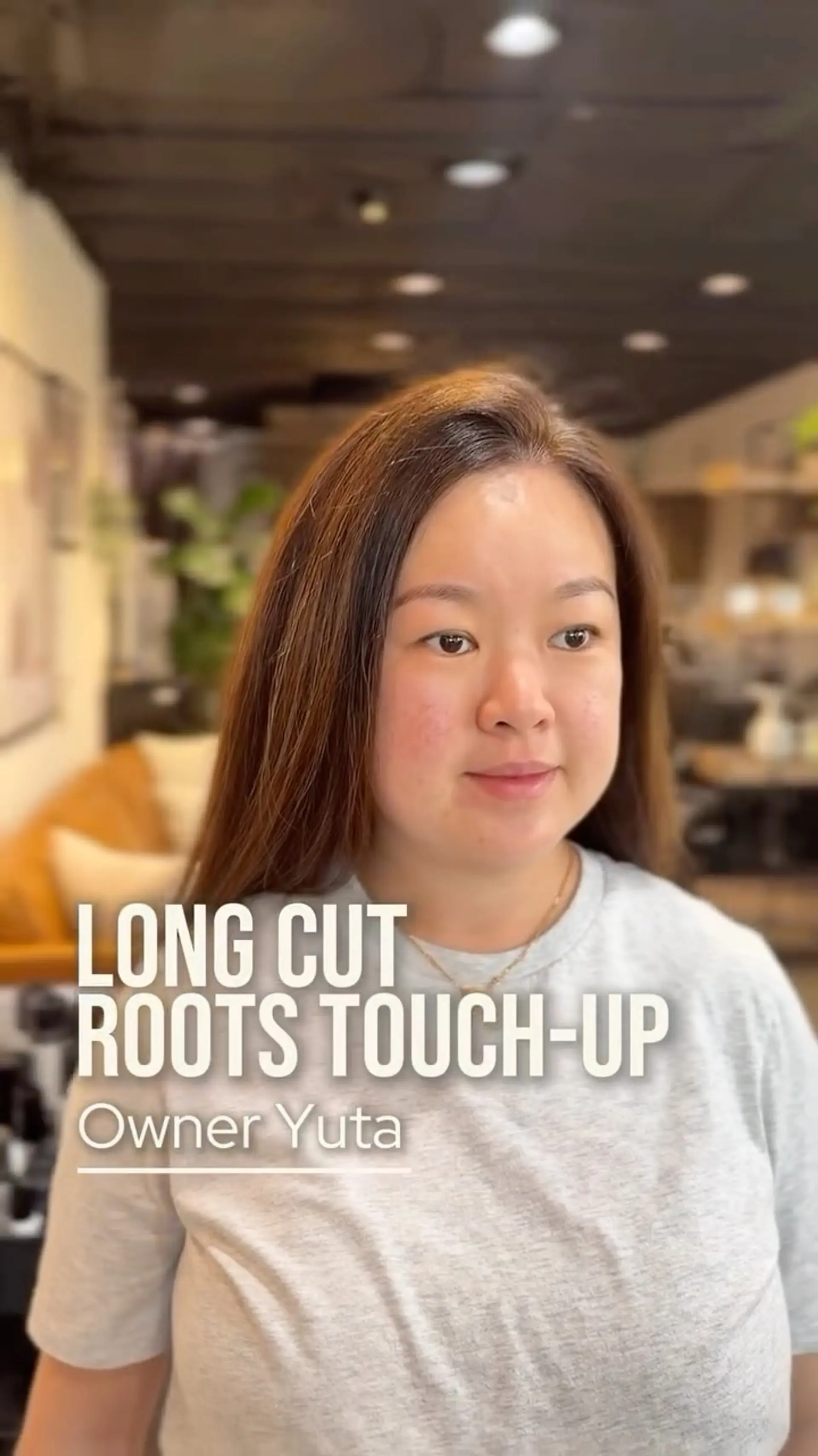 A sleek, long straight haircut parted near the center with a polished blowout finish. 1