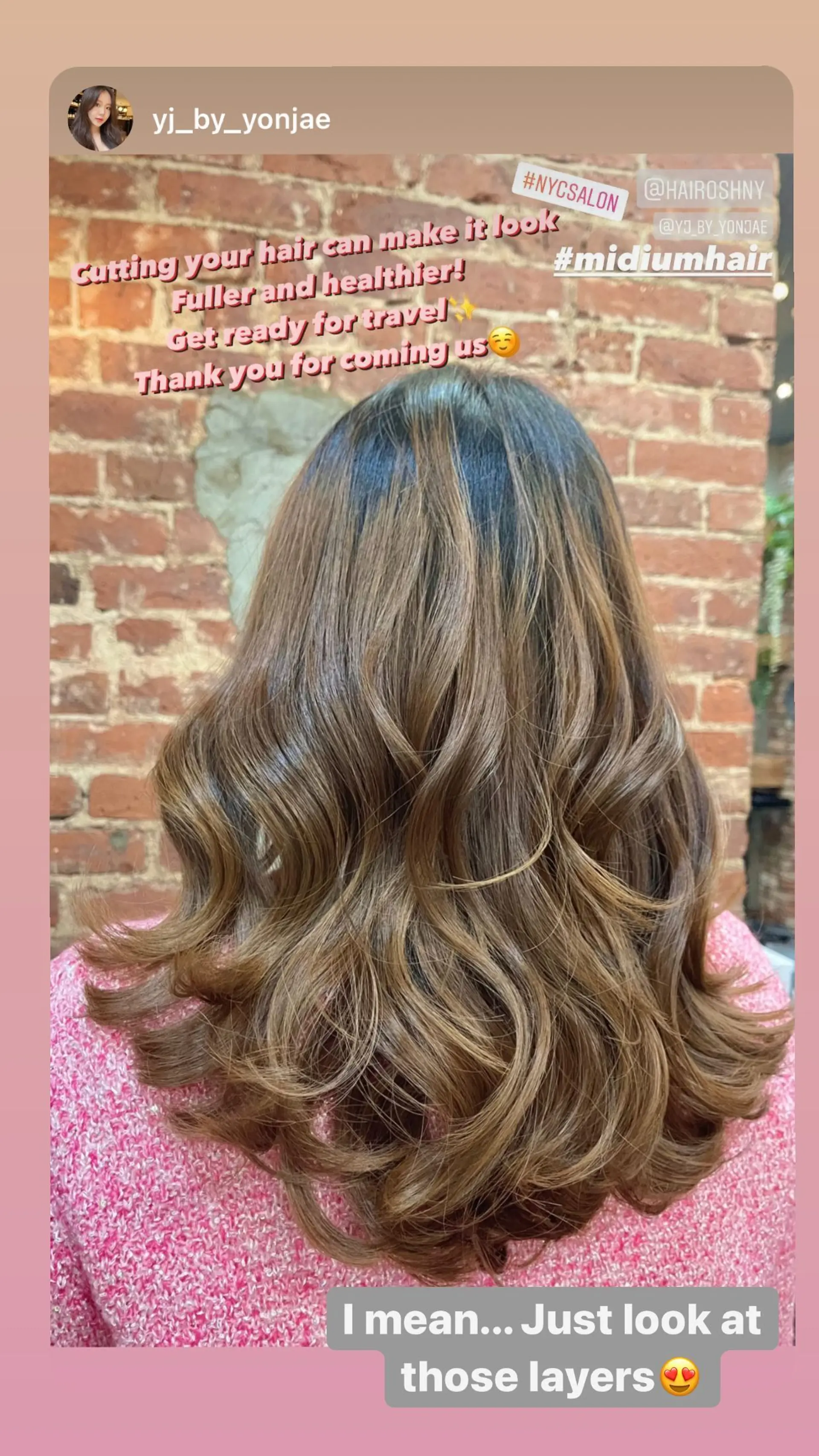 A medium-length wavy hairstyle with bronde balayage and layers for volume. 1