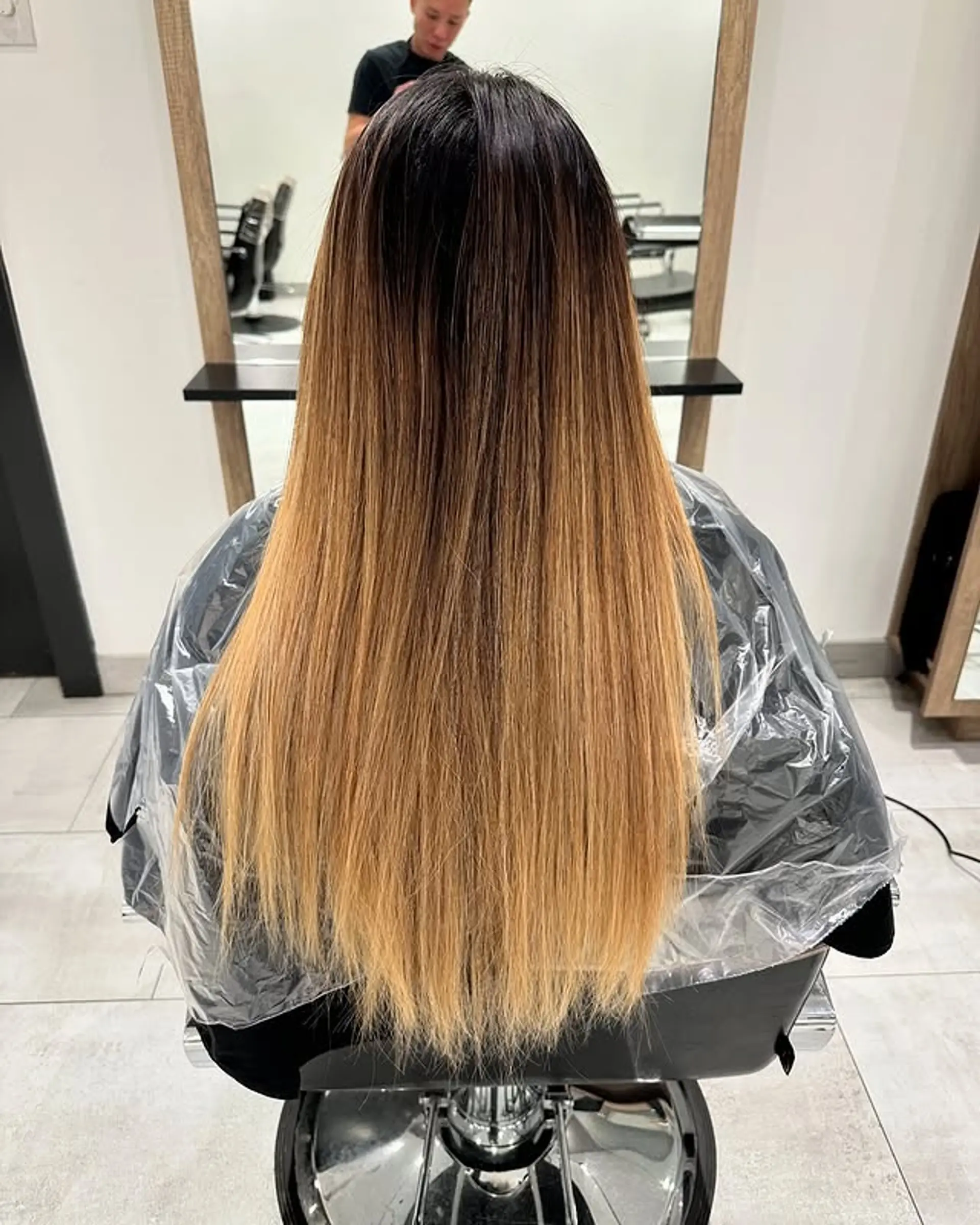 Long layered hair with a seamless ombre effect. 1