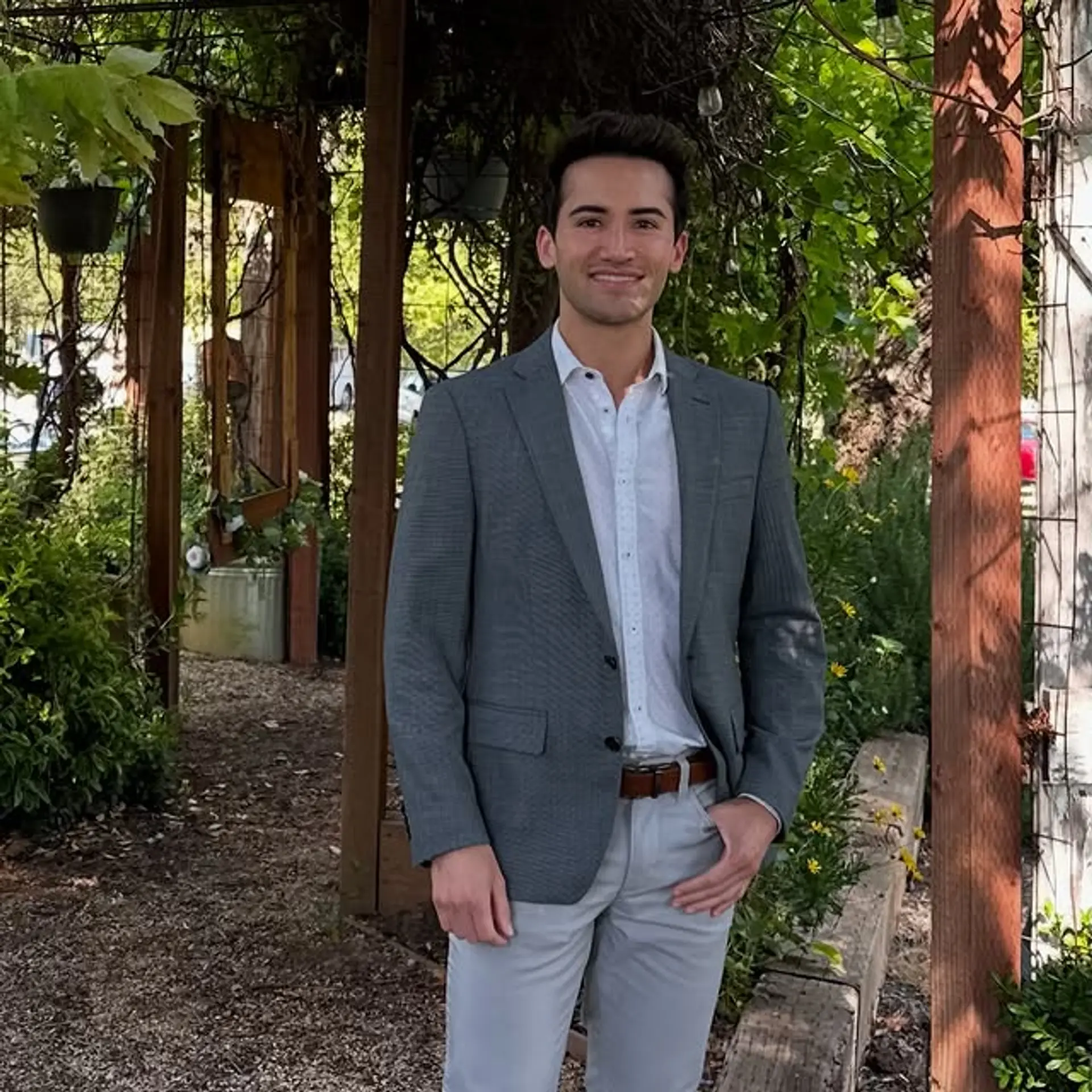 Short, tapered haircut with clean lines, perfect for a professional look. 1