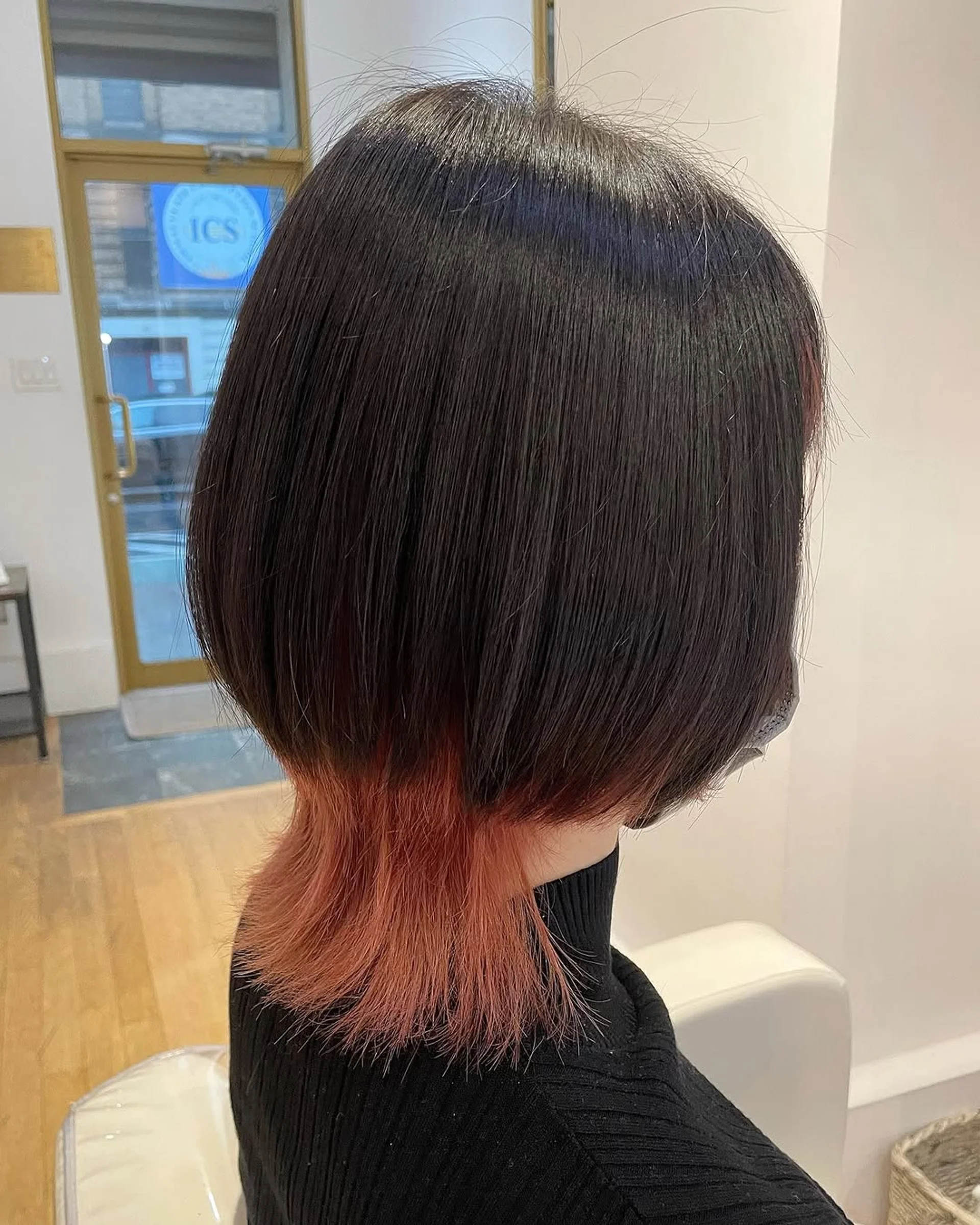 A model with long, wavy peachy blonde balayage, a key hair color trend for 2025 in NYC. - Preview 2