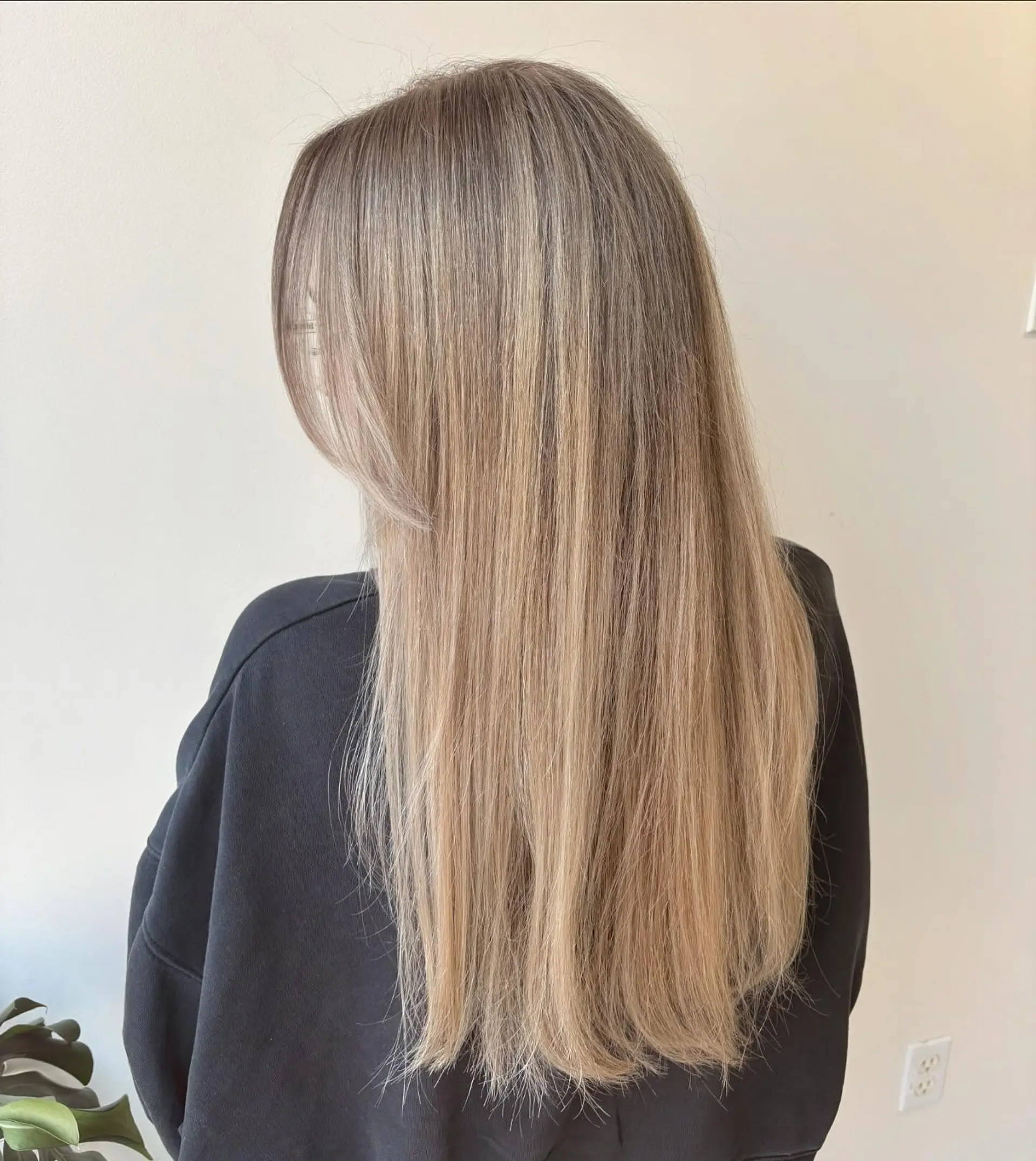 A sleek, long straight hairstyle featuring multi-tonal ash and beige blonde highlights with delicate face-framing layers. 1