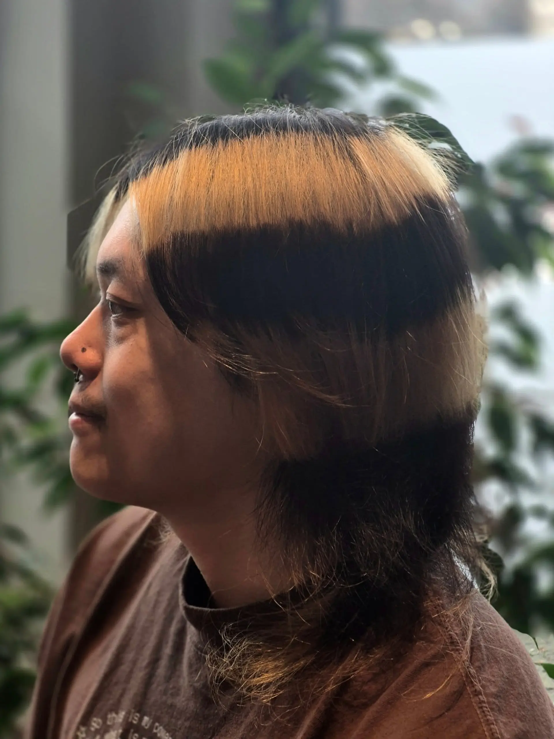 Layered medium-length mullet featuring distinct alternating horizontal bands of blonde and black color. 1