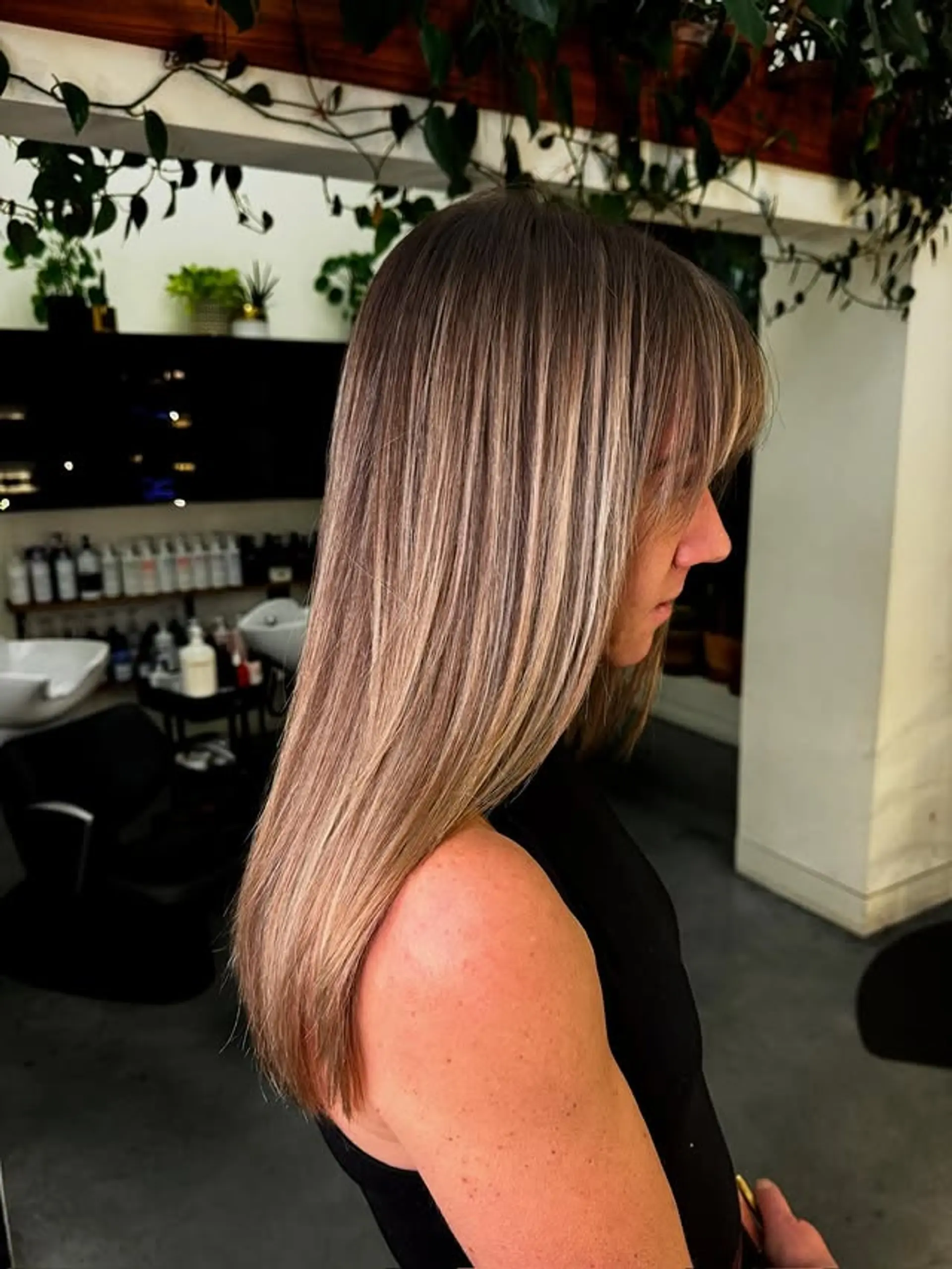 Long straight hair with face-framing bangs and highlights. 1