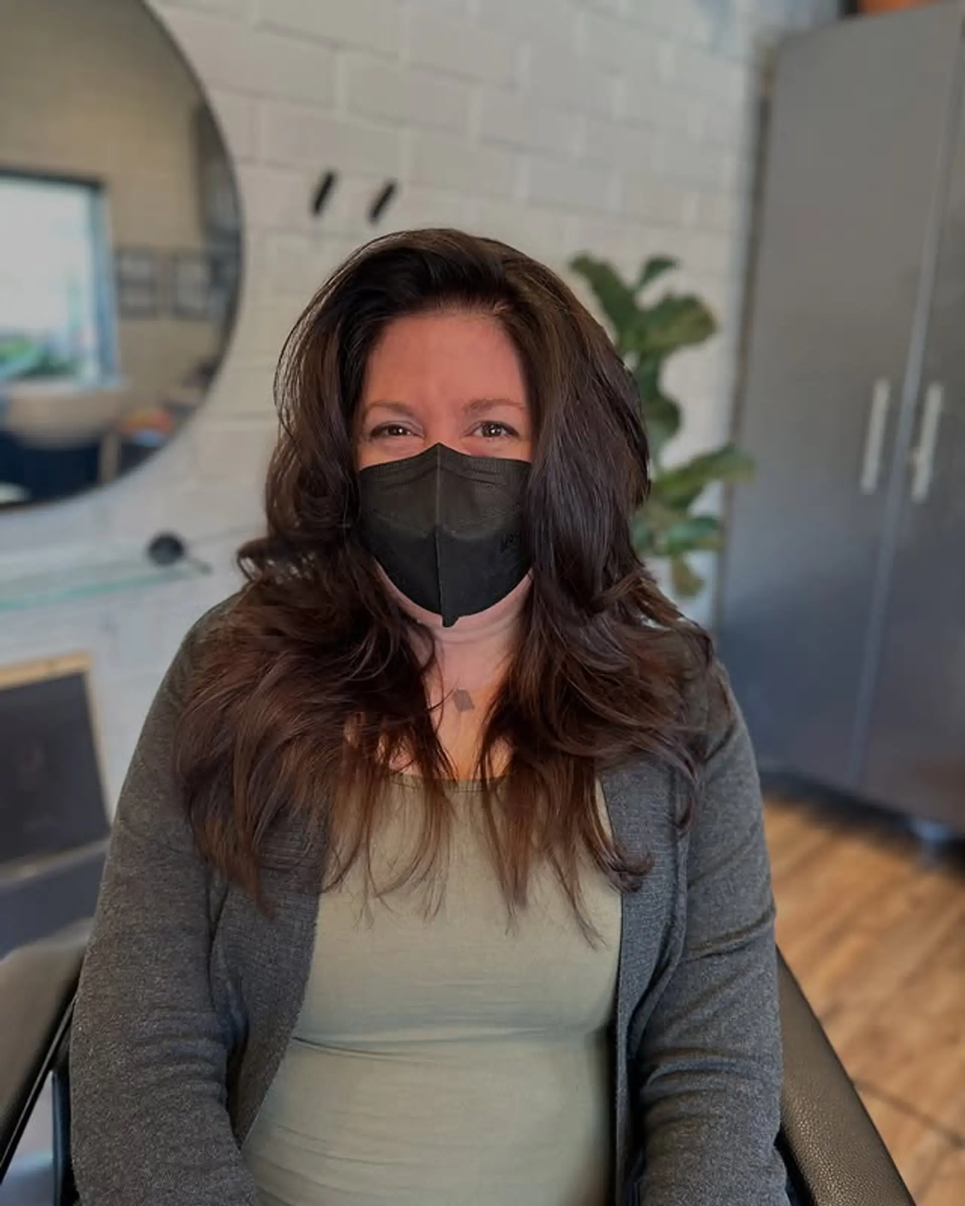 A long layered brunette hairstyle with a voluminous blowout. 1