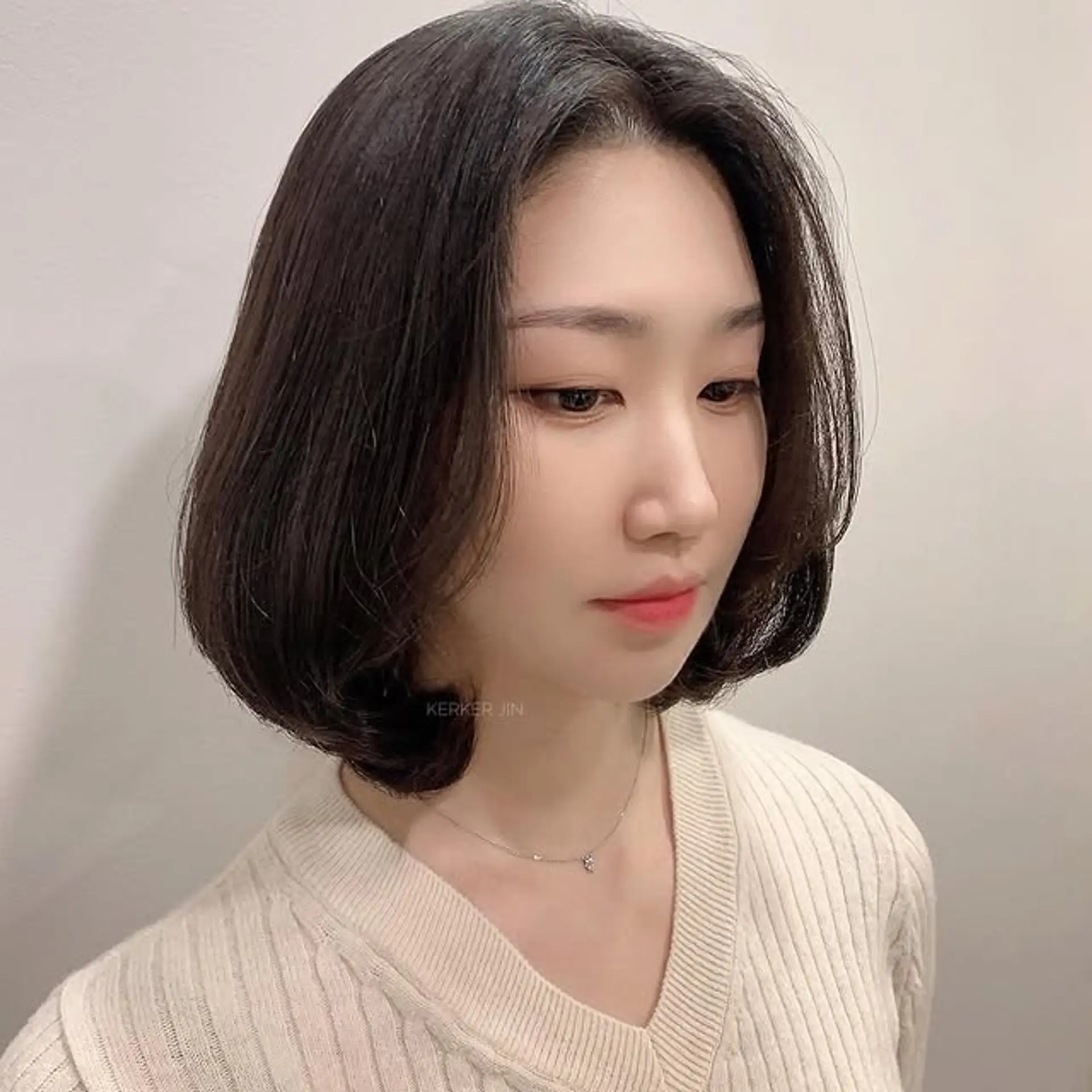 A modern and chic blunt bob with soft layering for added movement and volume. 1