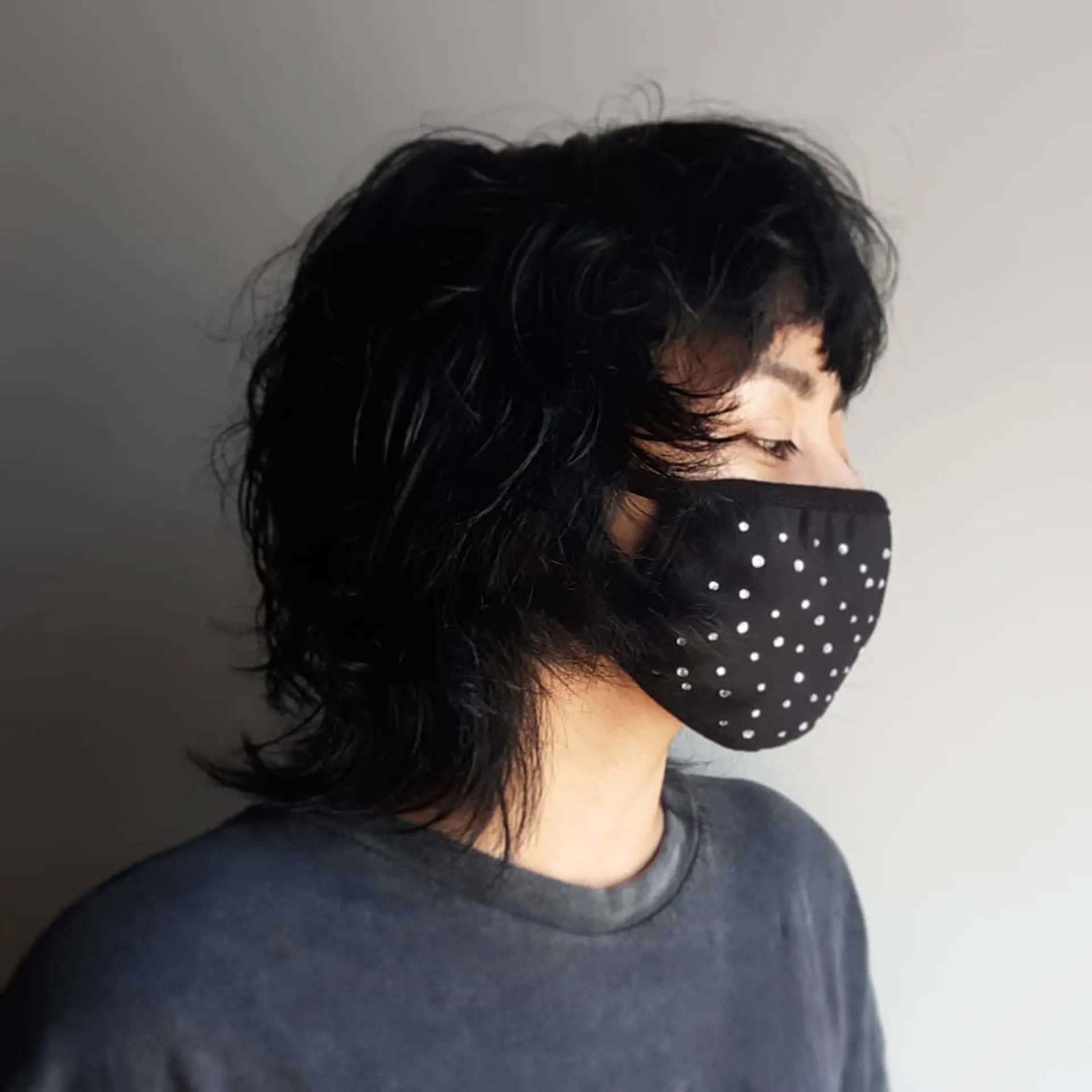 A shaggy mullet with choppy layers and full bangs. 1