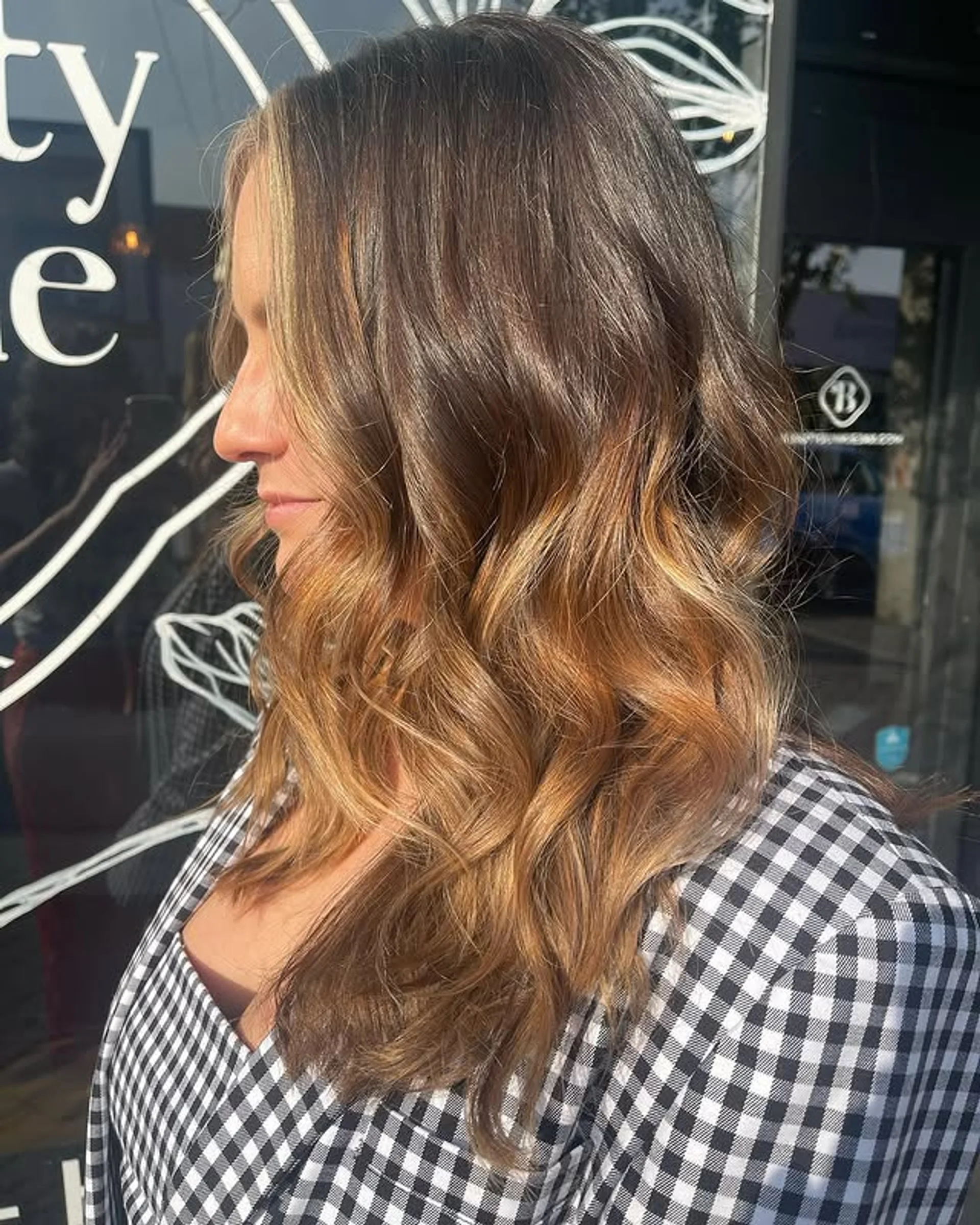 Long beachy waves with a rooted blonde balayage and subtle color melt - Preview 1