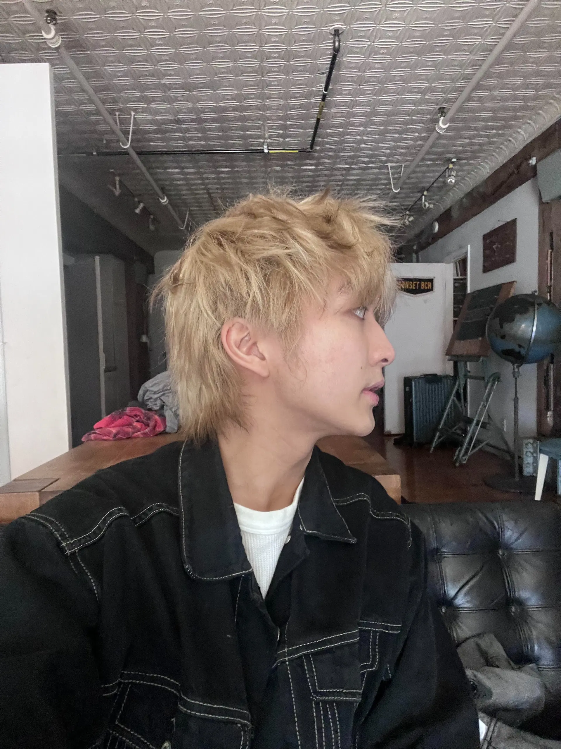 This textured platinum blonde wolf cut features choppy, textured layers for a modern and edgy look. 1